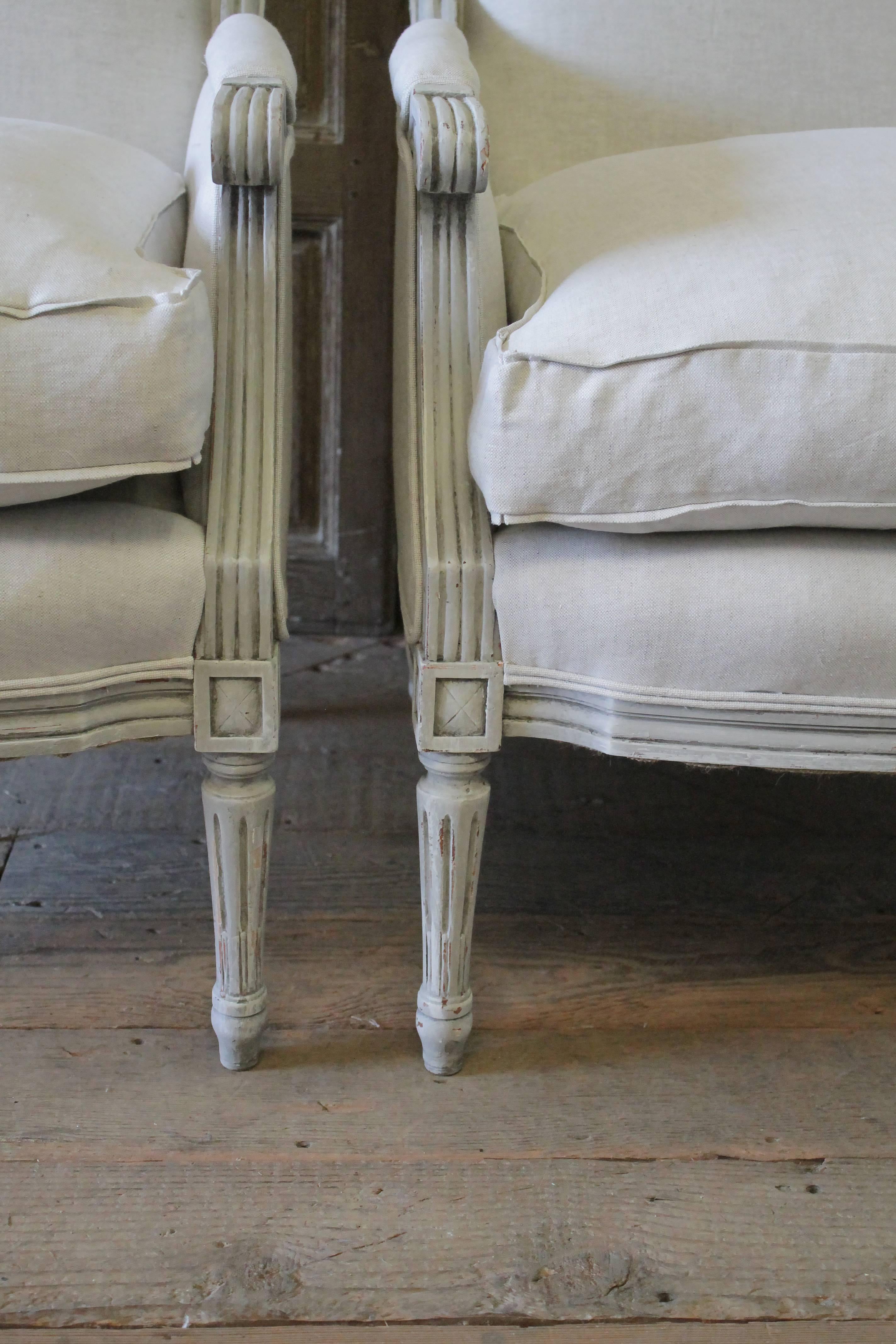 Pair of 20th Century Painted and Upholstered Louis XVI Style Bergere Chairs In Good Condition In Old Town Orange, CA