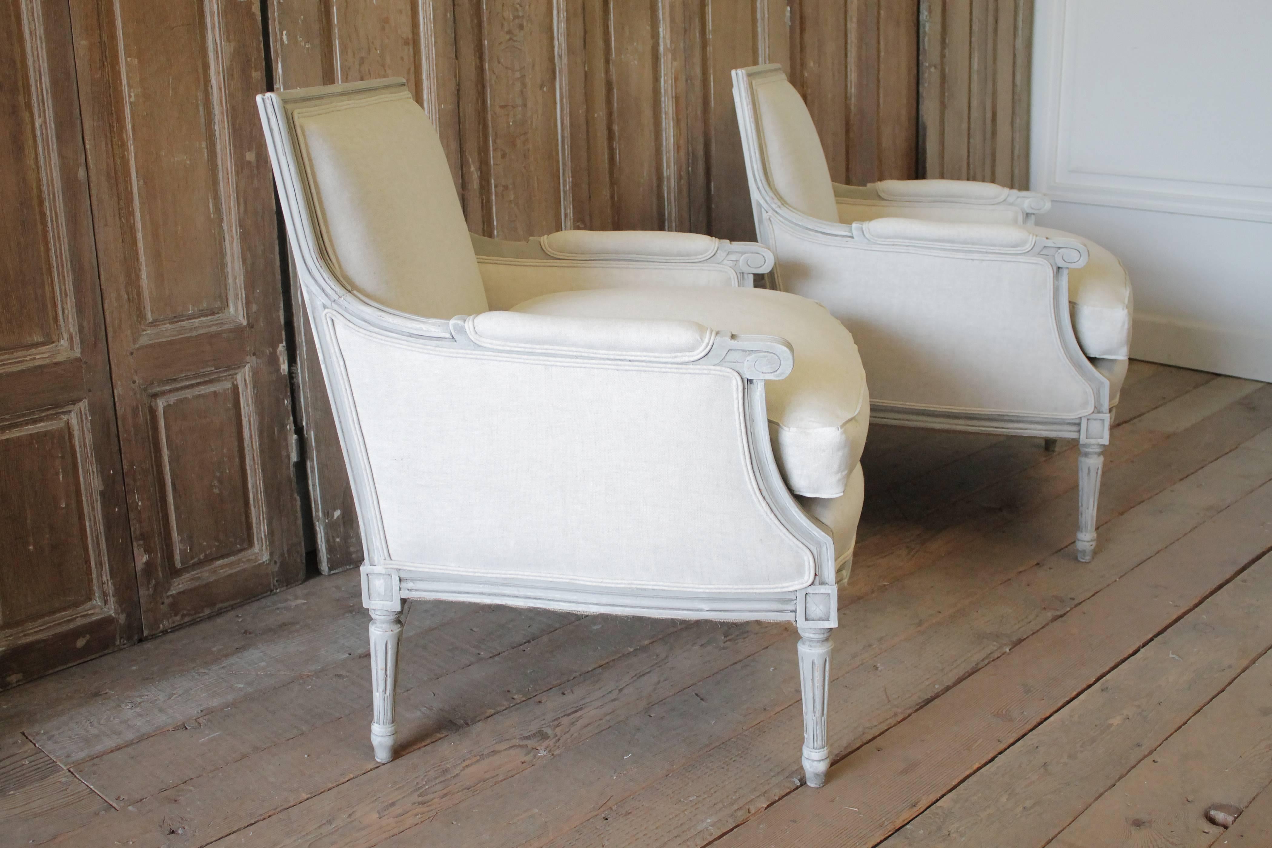 Pair of 20th Century Painted and Upholstered Louis XVI Style Bergere Chairs 1
