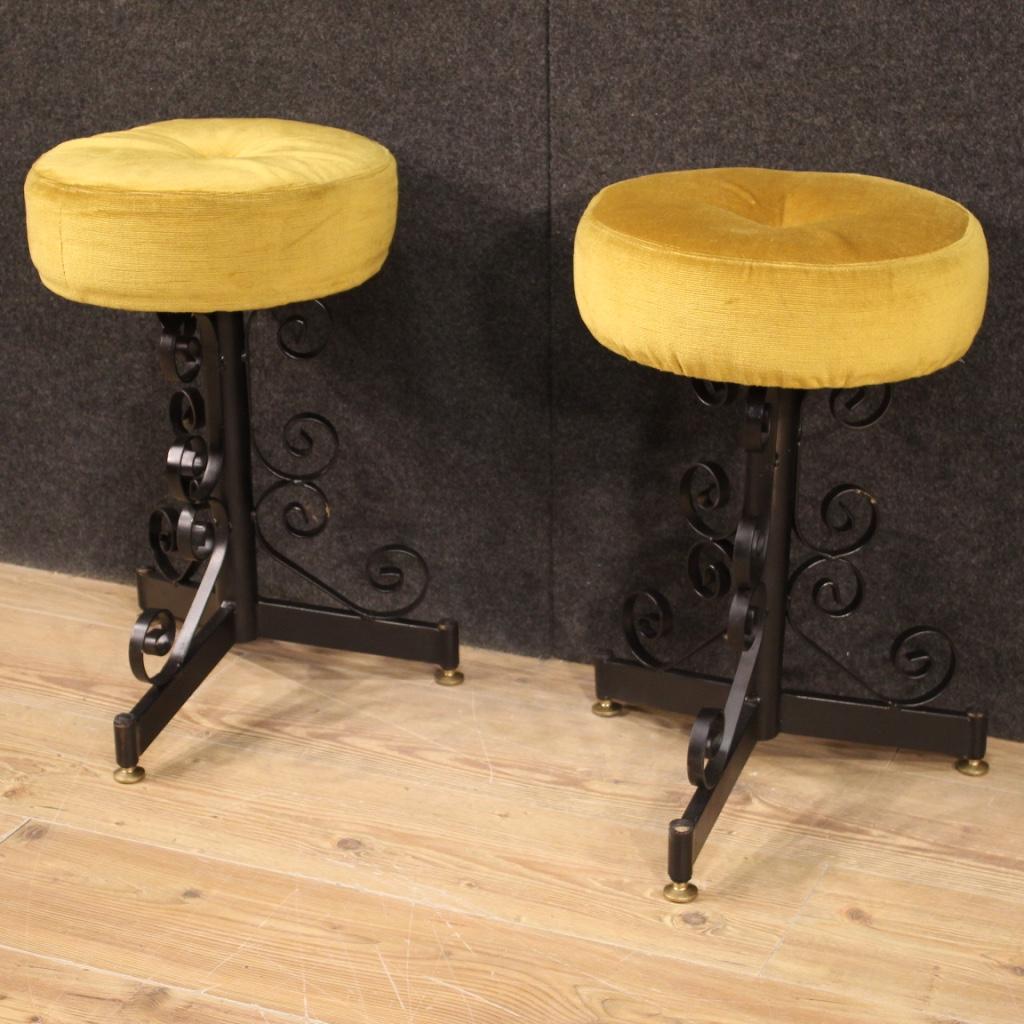 Pair of Italian stools from the 1970s. Painted iron furniture with velvet upholstered seats, of beautiful lines and pleasant decor. Stools of limited size, it can be easily positioned in different parts of the house. Comfortable furniture with a