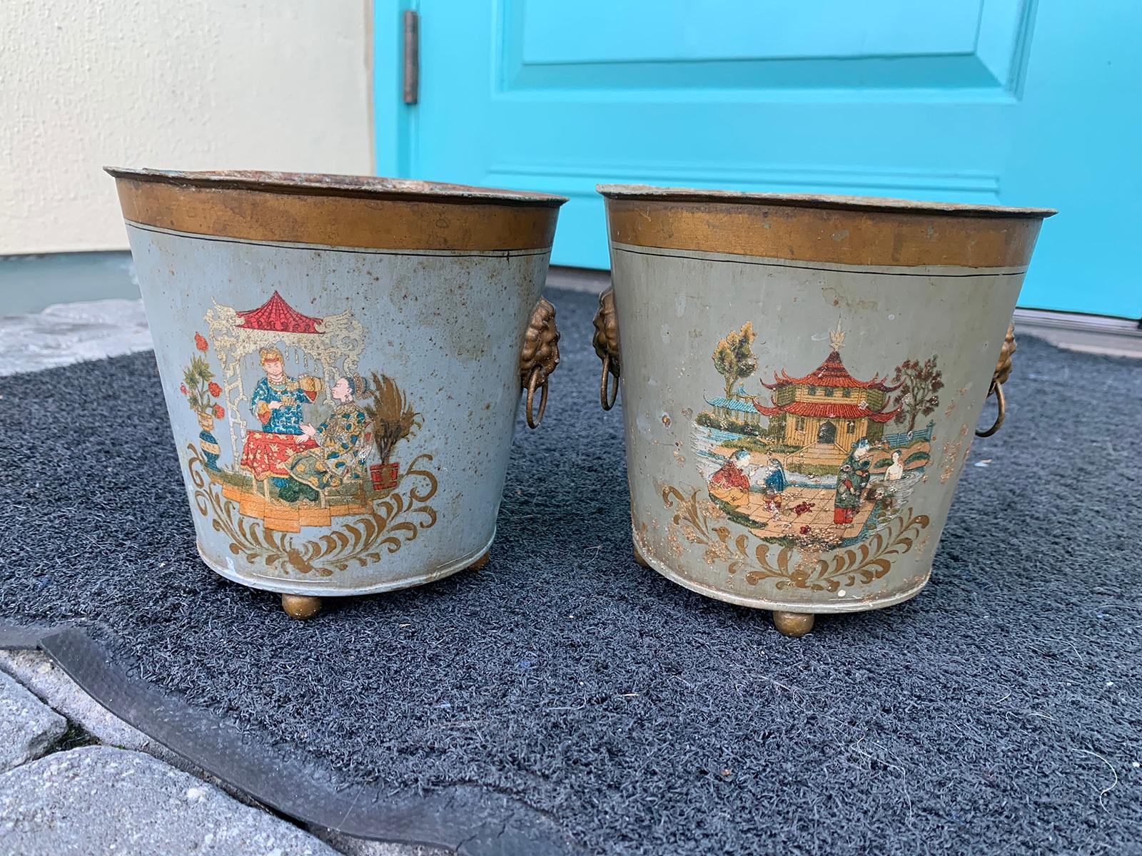 Pair of 20th century painted tole cachepots, signed EDE.