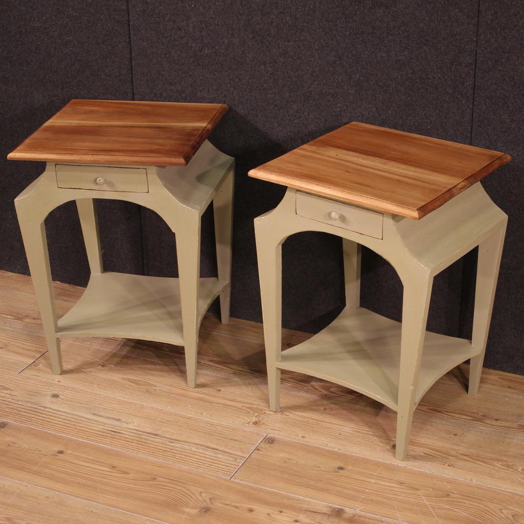 Pair of Italian bedside tables from the second half of the 20th century. Beautifully carved and painted wooden furniture of pleasant decor. Bedside tables of excellent proportions ideal to be placed in a bedroom or living room, for antique dealers