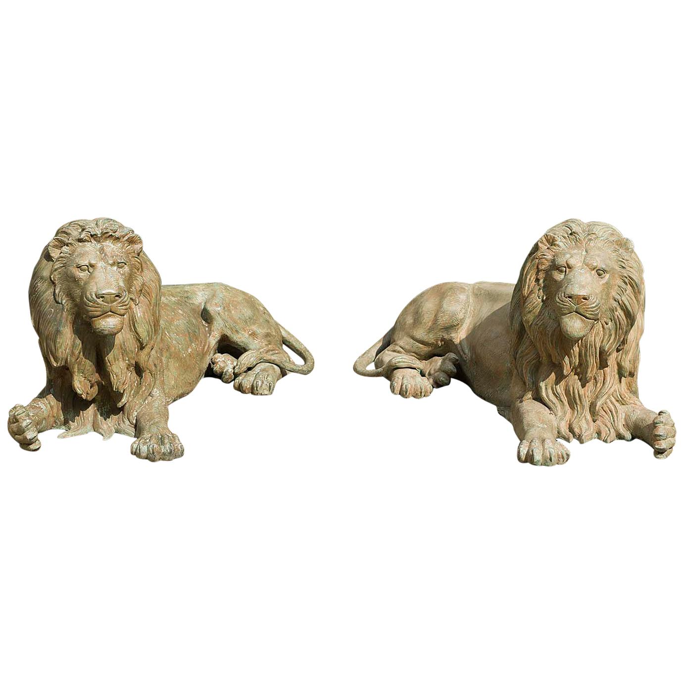 Pair of 20th Century Patinated Bronze Lions