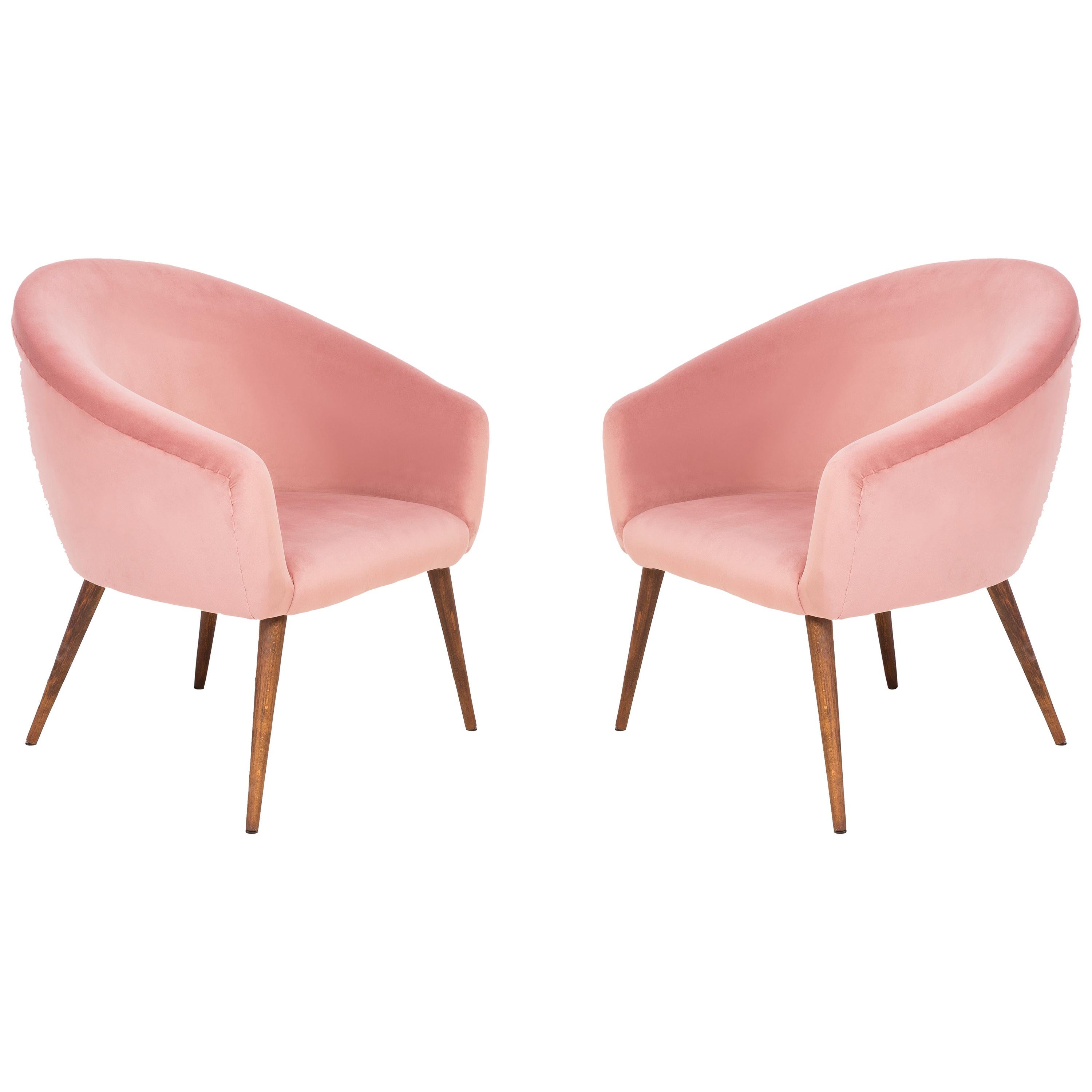 Paire de fauteuils club en velours rose à coquille:: années 60