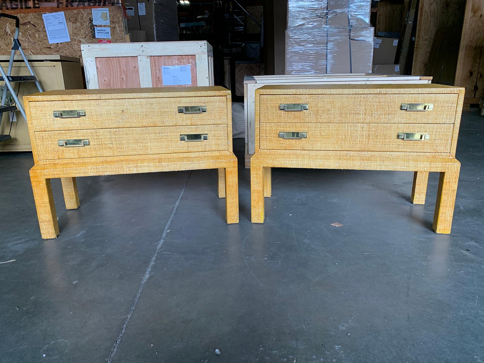 Pair of 20th century raffia covered side tables with two drawers in the style of Bielecky Brothers.
Measures: Overall: 33.75