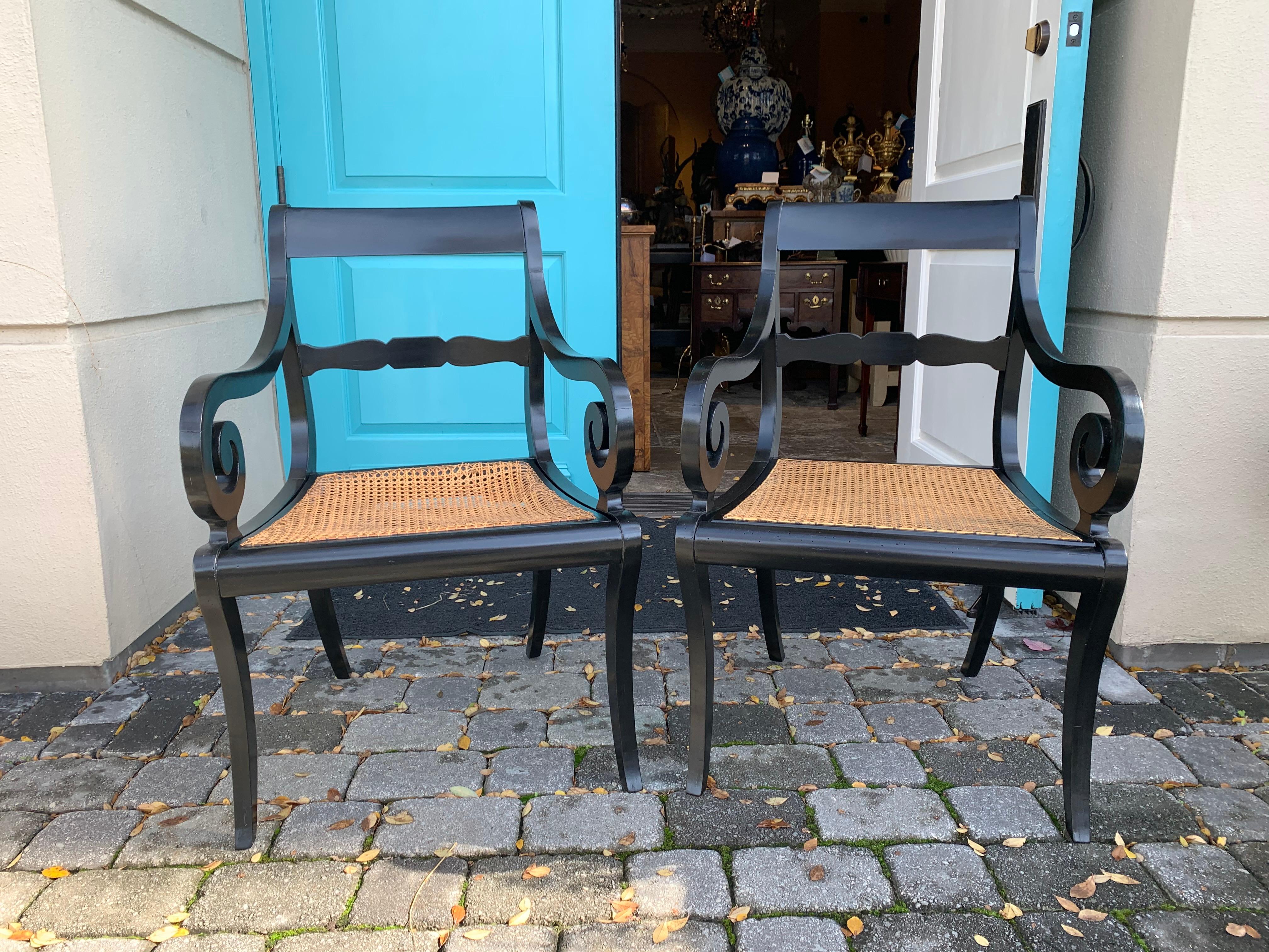 Pair of 20th century Regency style black armchairs with cane seats, circa 1900
large scale
Measures: 23