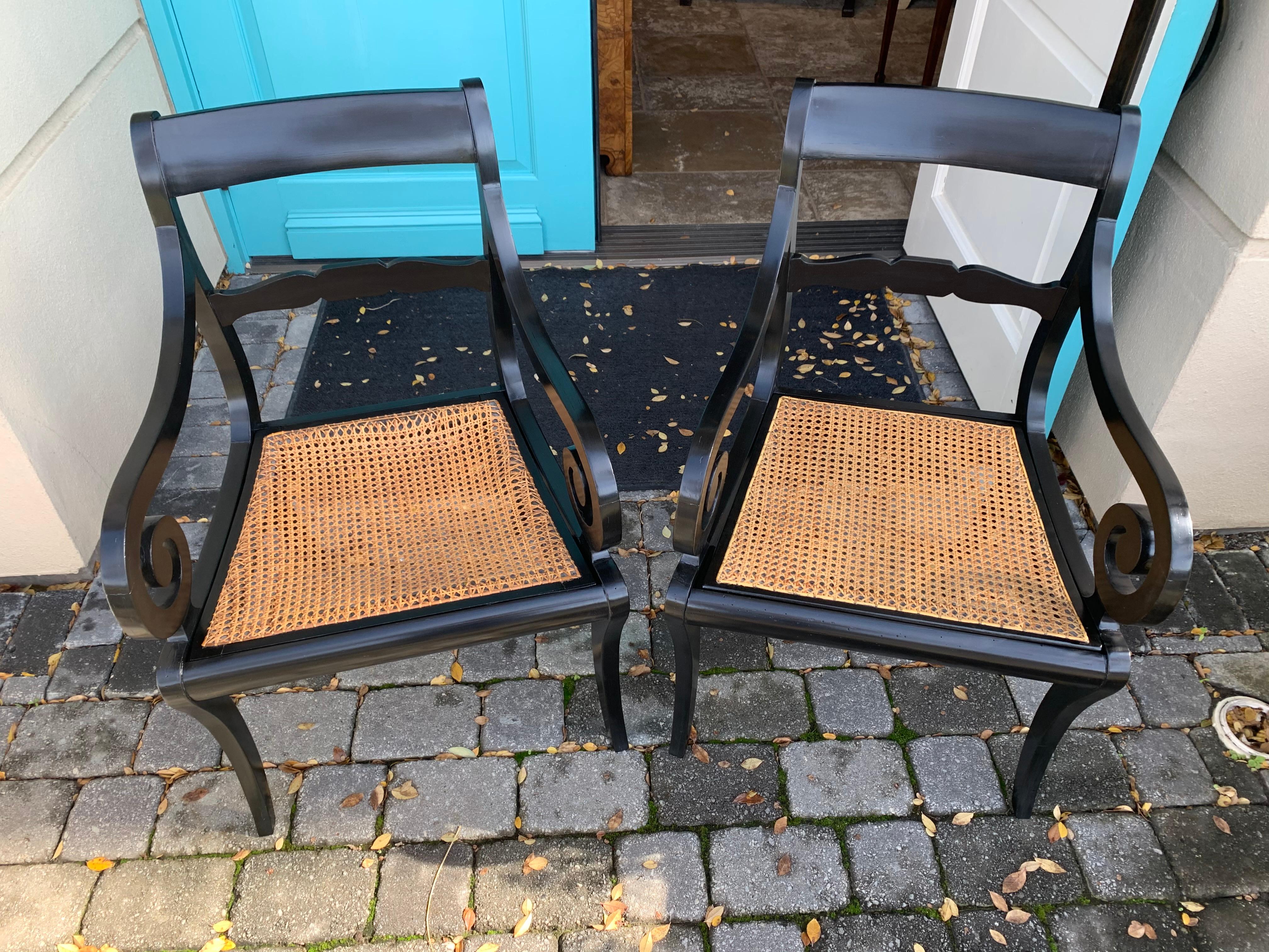 Early 20th Century Pair of 20th Century Regency Style Black Armchairs with Cane Seats, circa 1900