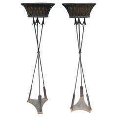 Pair of 20th Century Regency Style Iron Torcheres/Plant Stands with Arrow Motif