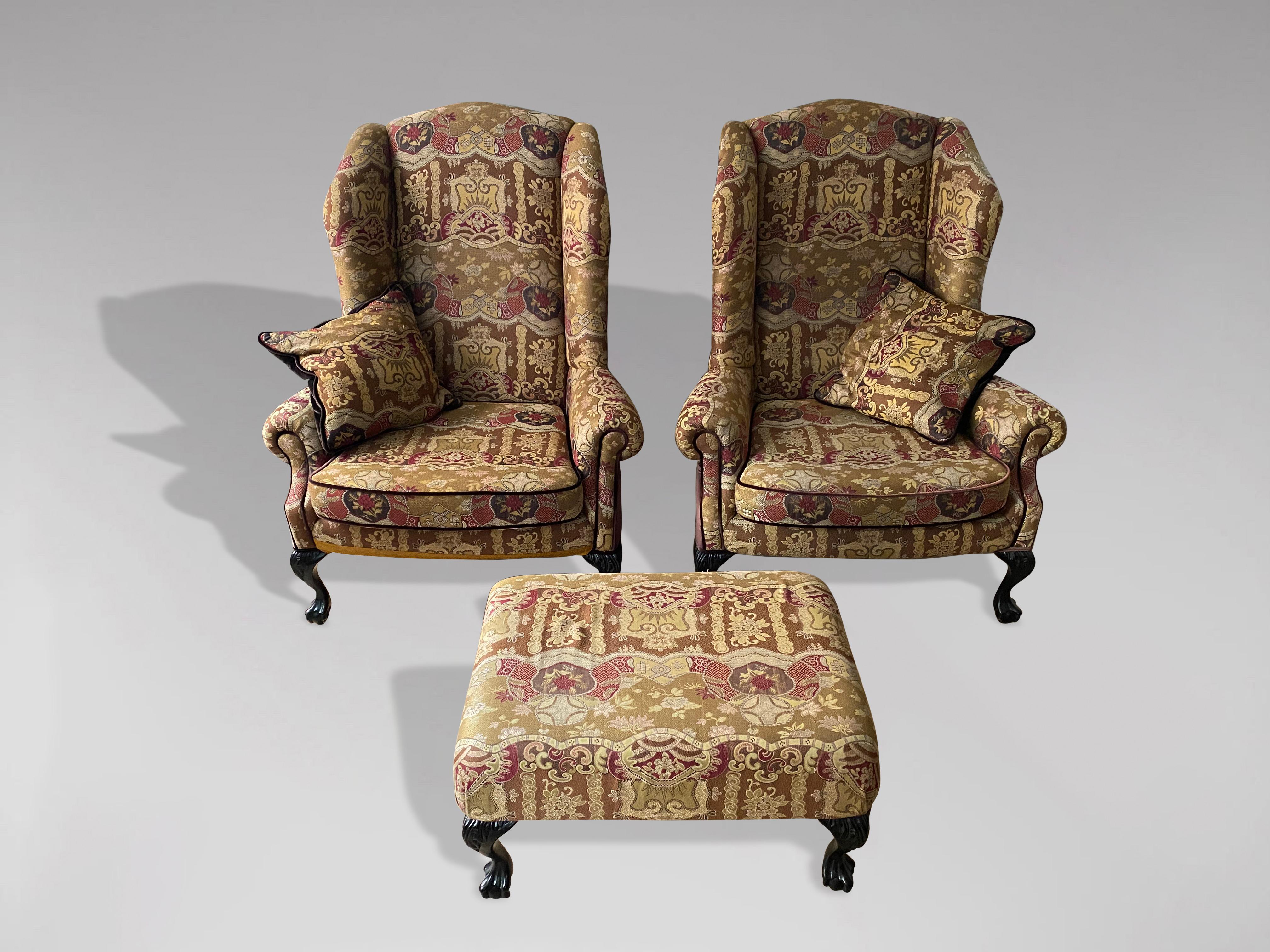 British Pair of 20th Century Reupholstered Wing Armchairs with Footstool