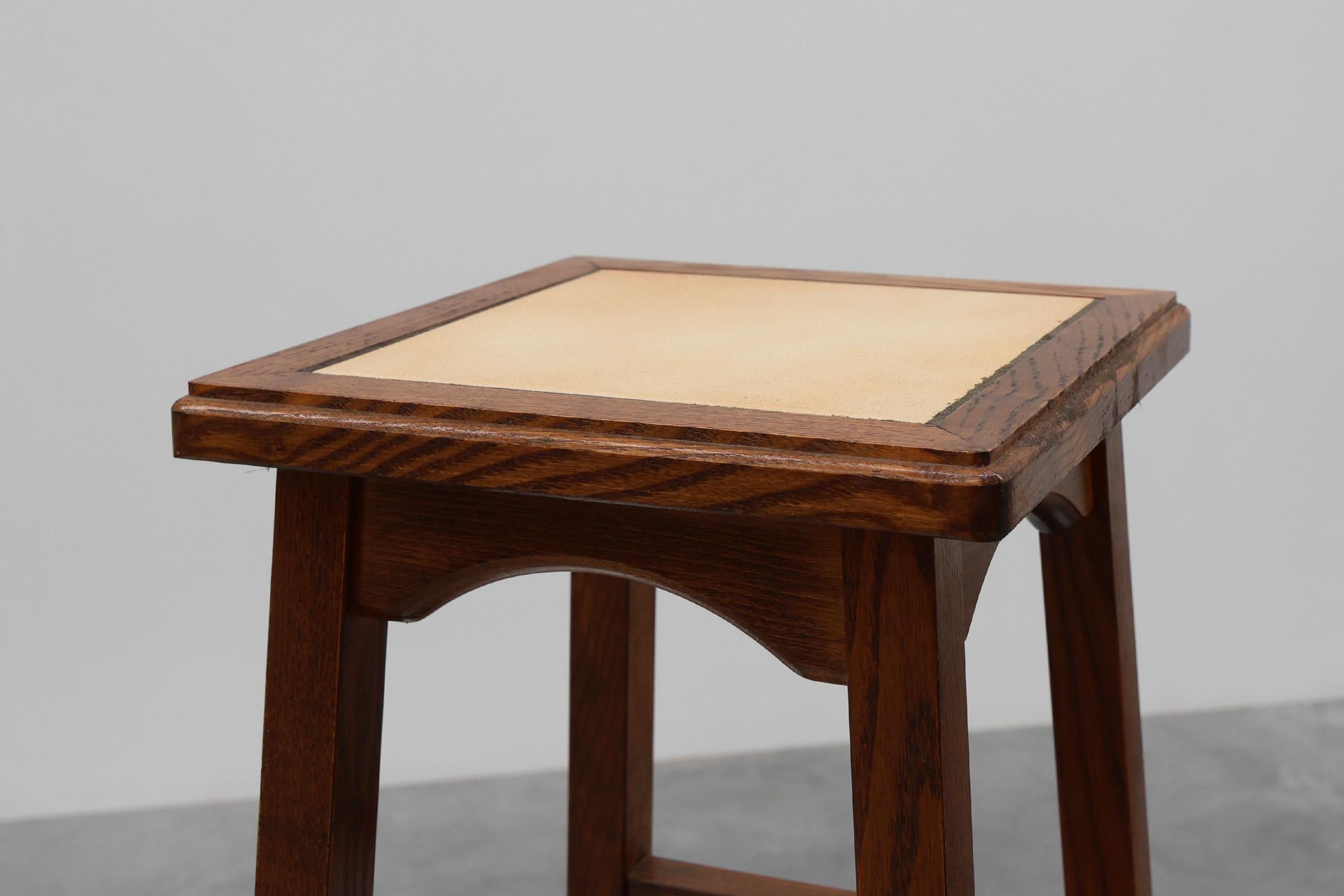 France / 1940 / 2 Side Tables / wood, ceramics / Rustic / Mid-century / French Provincial

Two side tables or pedestals with two triers and square tile top. Crafted in wood in the 1940s in France. The charming tables are decorated with beaded bars