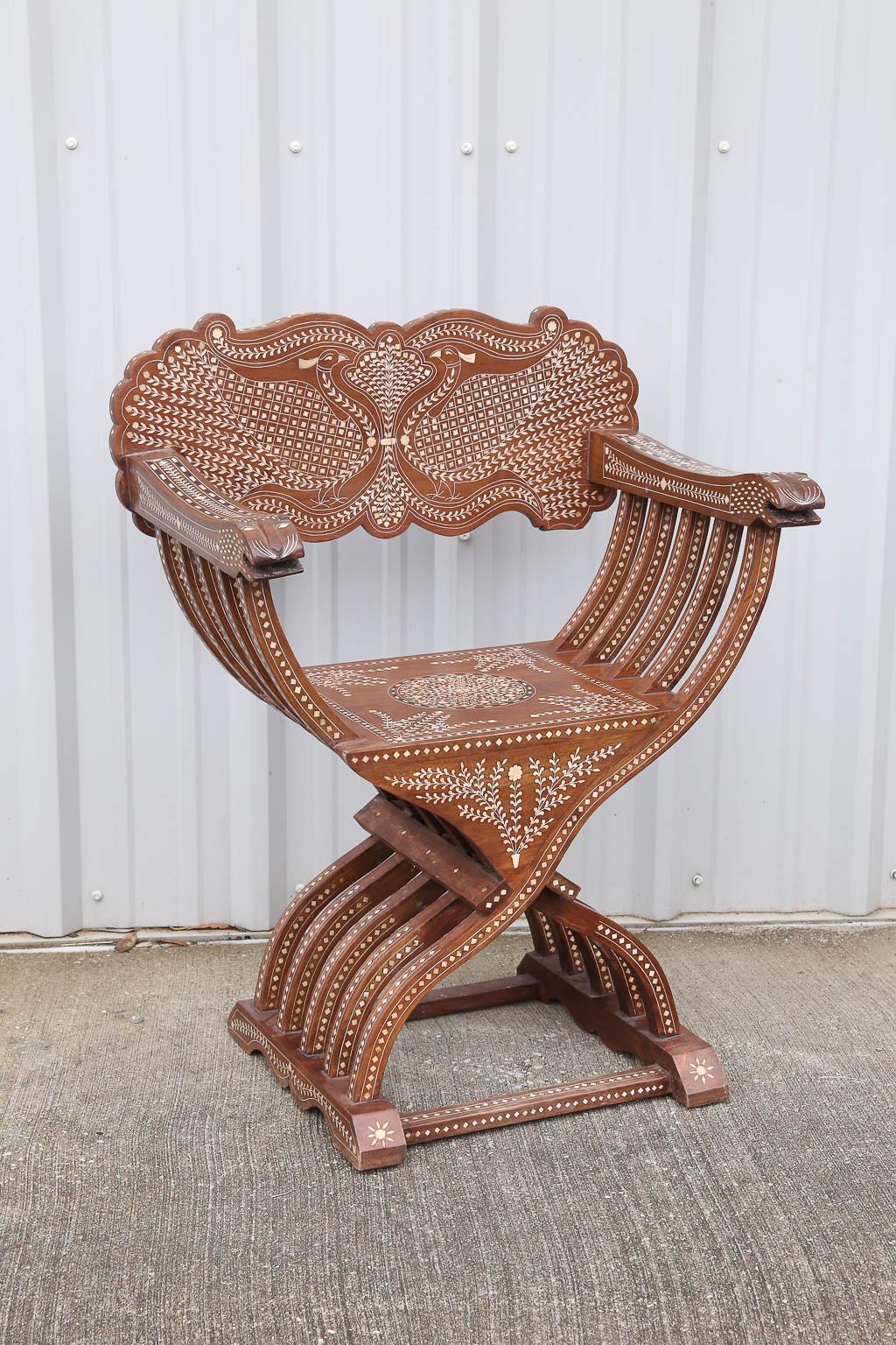 These chairs were made on commission in the 20th century for European missionaries settled in the Coromandel coast of India. These chairs were handcrafted by skilled artisans for the use of missionaries from Europe. The superb inlay work make these