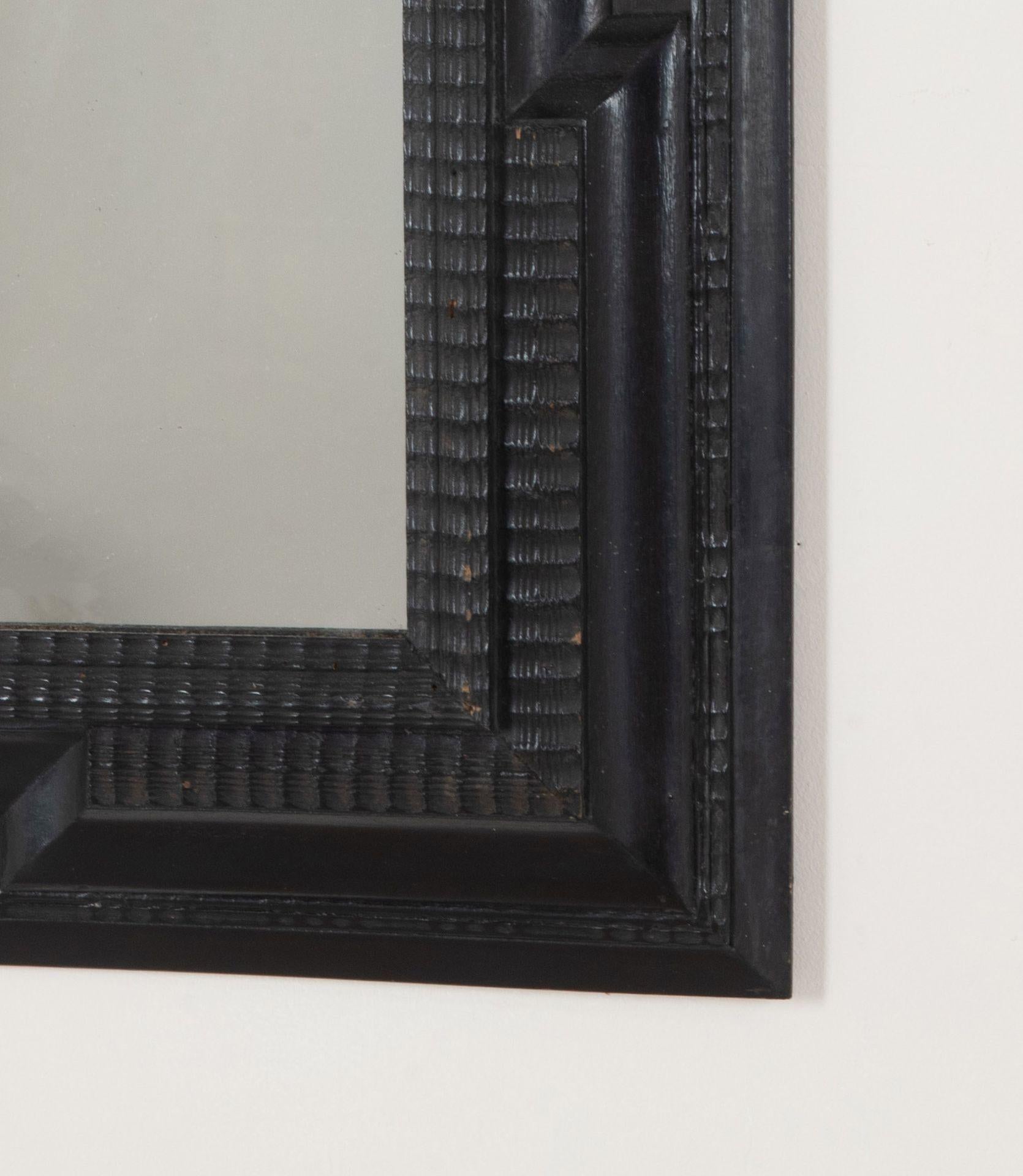 Ebonized Pair of 20th Century Spanish Ebonised Ripple Moulded Mirrors For Sale