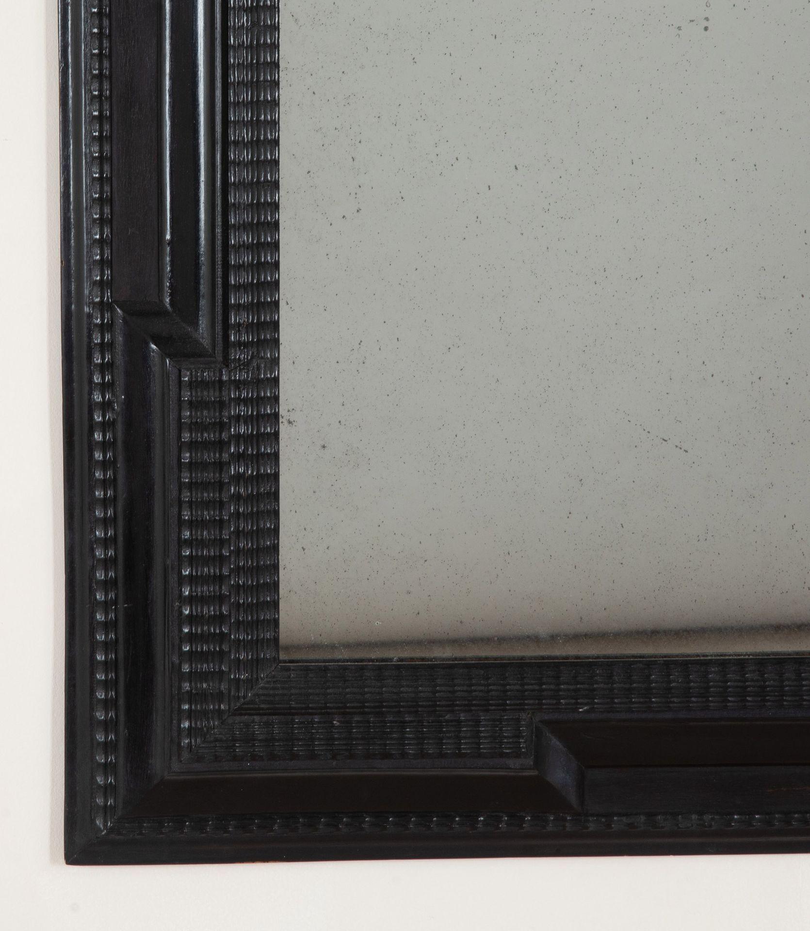 Pair of 20th Century Spanish Ebonised Ripple Moulded Mirrors In Good Condition For Sale In Gloucestershire, GB