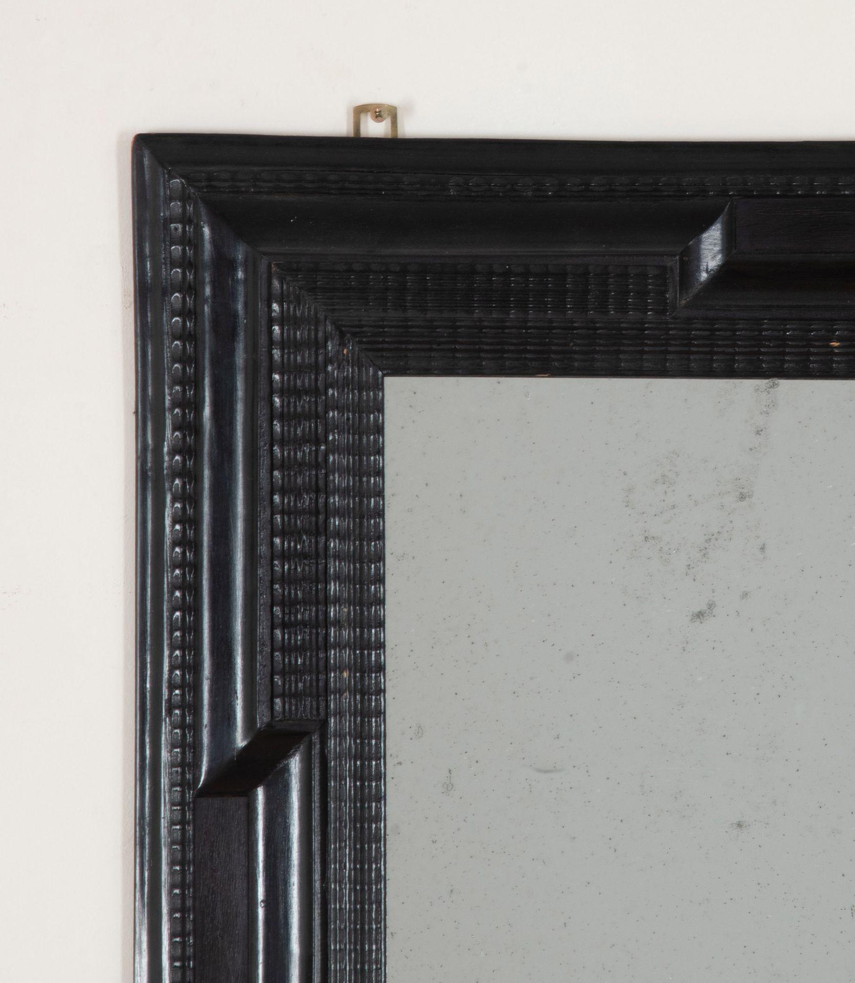 Pair of 20th Century Spanish Ebonised Ripple Moulded Mirrors For Sale 1