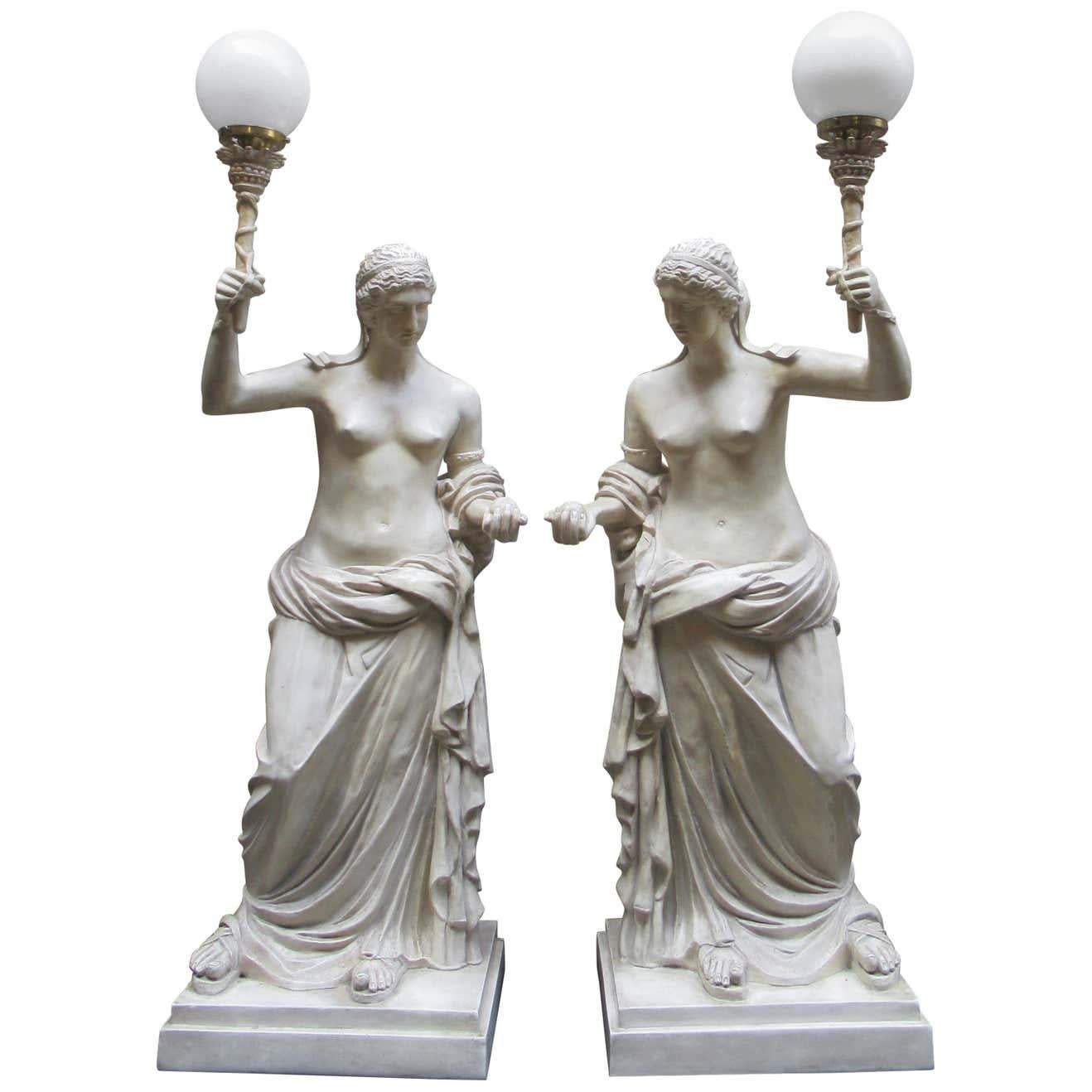Pair of 20th century vintage Christopher Wray plaster figural lamps depicting Roman women, signed by artist. M. Osman.