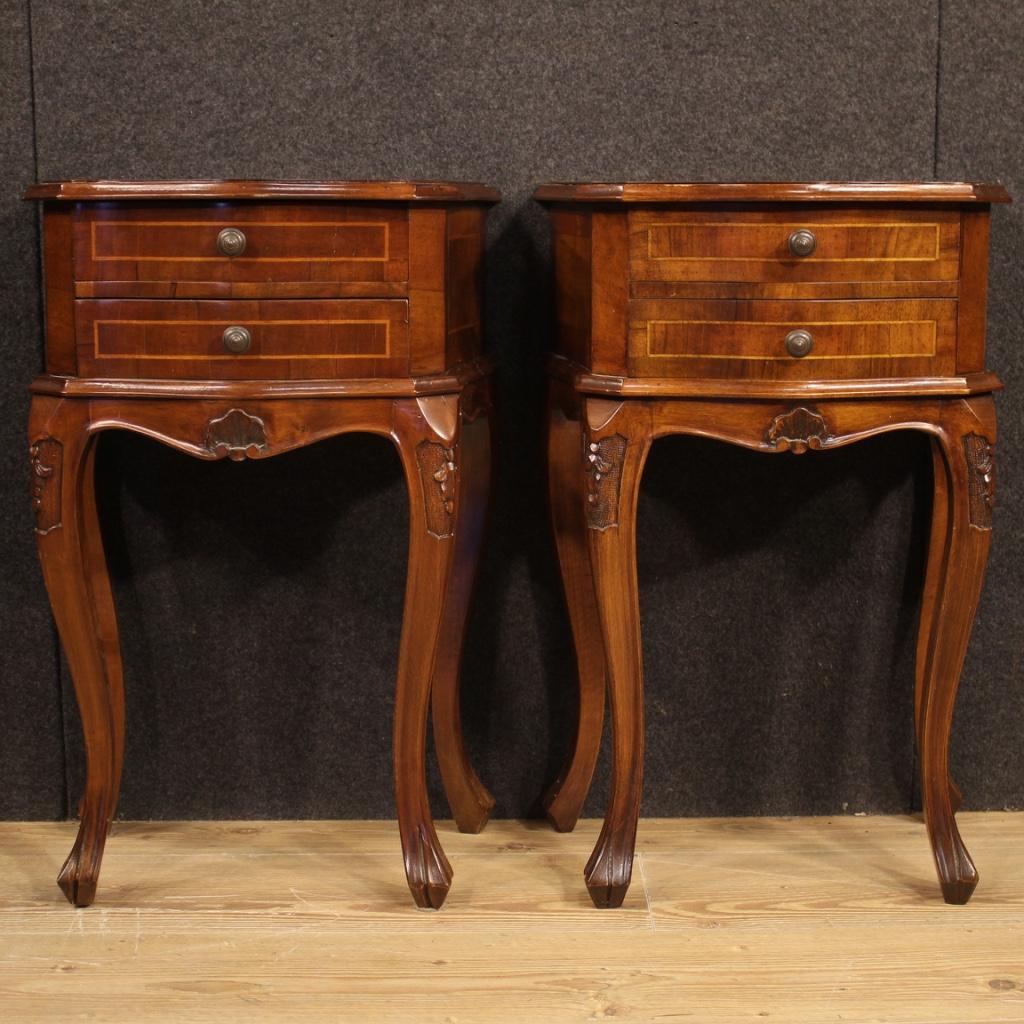 Pair of Venetian bedside tables from the 20th century. Furniture carved in walnut and beech with maple inlay of pleasant decoration. High leg bedside tables, equipped with two drawers and a wooden top with a discreet service. Ideal furniture to be
