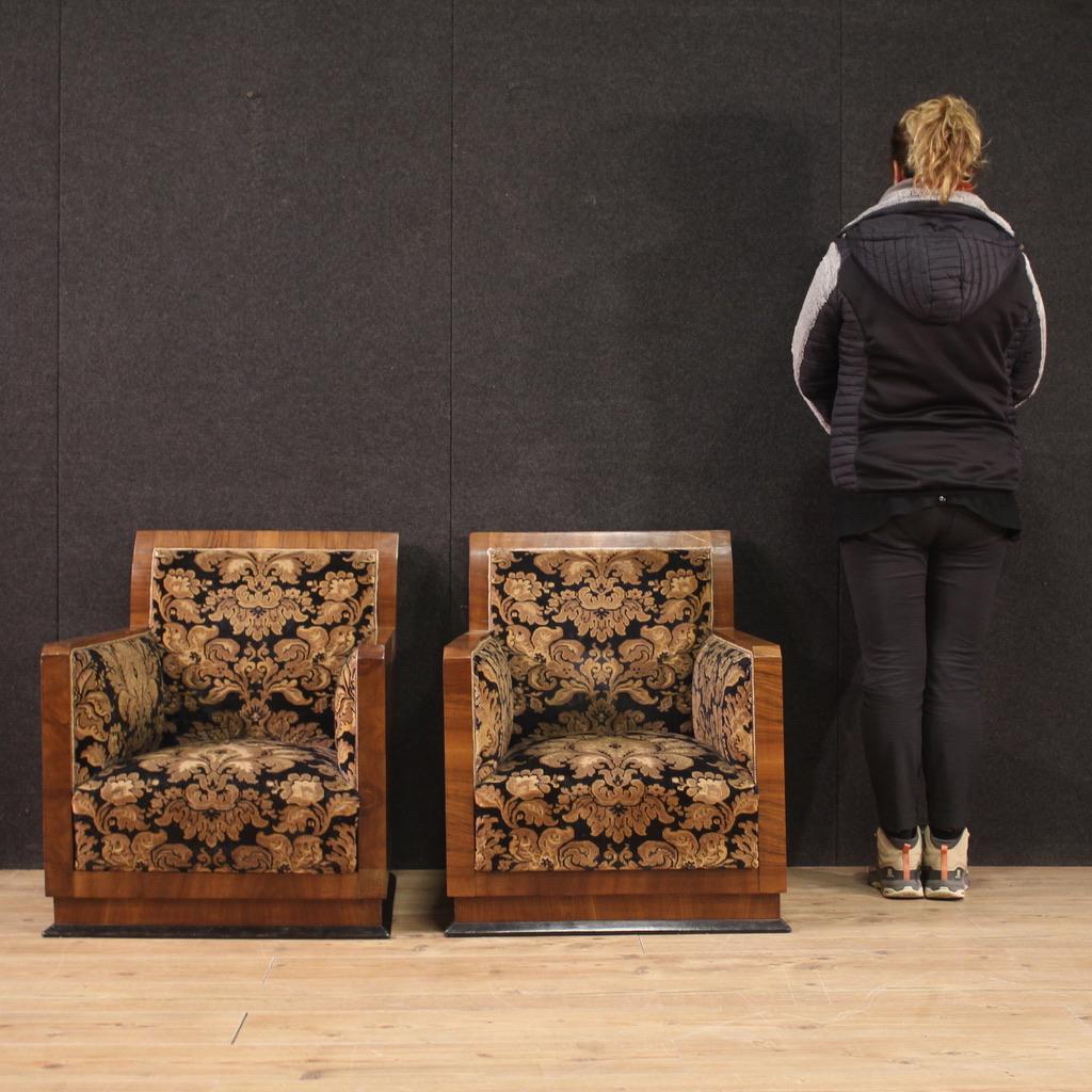 Pair of Italian armchairs from the first half of the 20th century. Art Deco furniture carved and veneered in walnut and ebonized wood, of fabulous line and pleasant decor. Armchairs finished for center to base with ebonized finish (see photo). Seats
