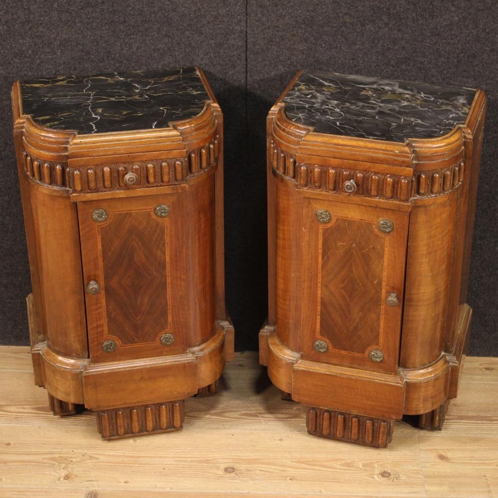 Pair of Italian bedside tables from the Art Deco period. Furniture carved and inlaid in walnut, maple, rosewood and beech of beautiful lines and pleasant decor. Bedside tables of great character equipped with a door and a drawer of good capacity and