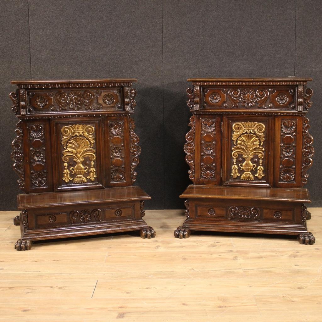 Pair of Italian kneelers from the mid-20th century. Furniture finely carved and chiseled in walnut and beech in Renaissance style. Kneelers, right and left, complete with two compartments under the wooden floors (lower and upper, see photo) and