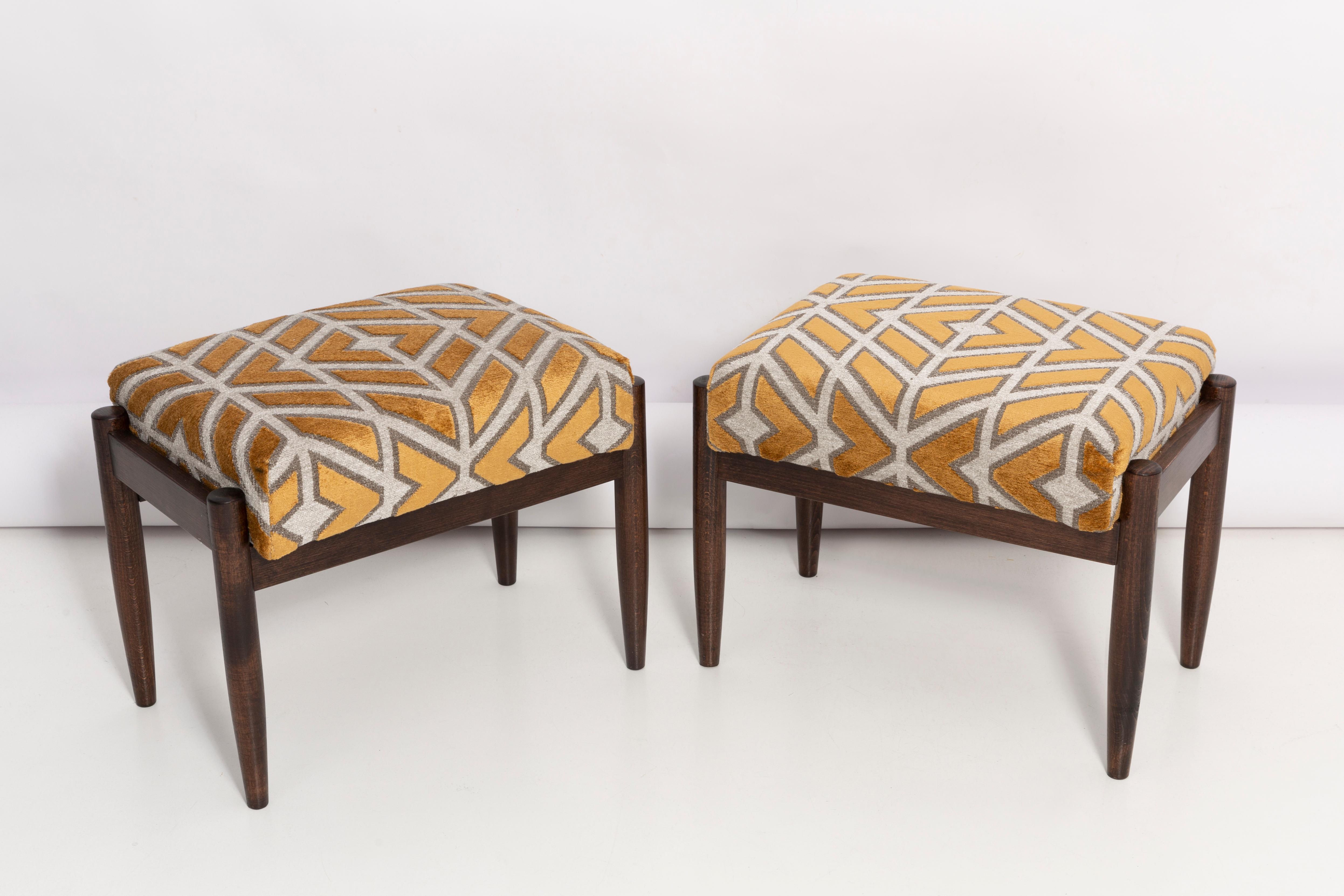 Stools from the turn of the 1960s. Beautiful yellow pattern high quality spanish gull lamadrid velvet upholstery. The stools consists of an upholstered part, a seat and wooden legs narrowing downwards, characteristic of the 1960s style. We can