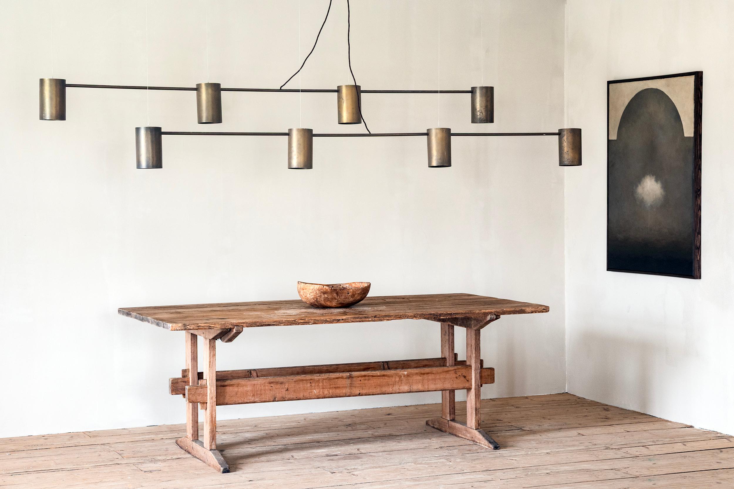 Pair of 20th century Danish brass chandeliers with four down lights on each, unknown designer. ca 1960. Provenance: Magasin Du Nord (See pic), Copenhagen, Denmark. 