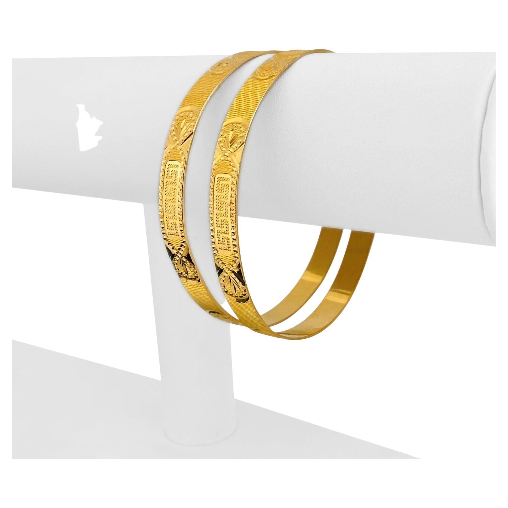 Pair of 21 Karat Yellow Gold Diamond Cut Greek Key Bangle Bracelets