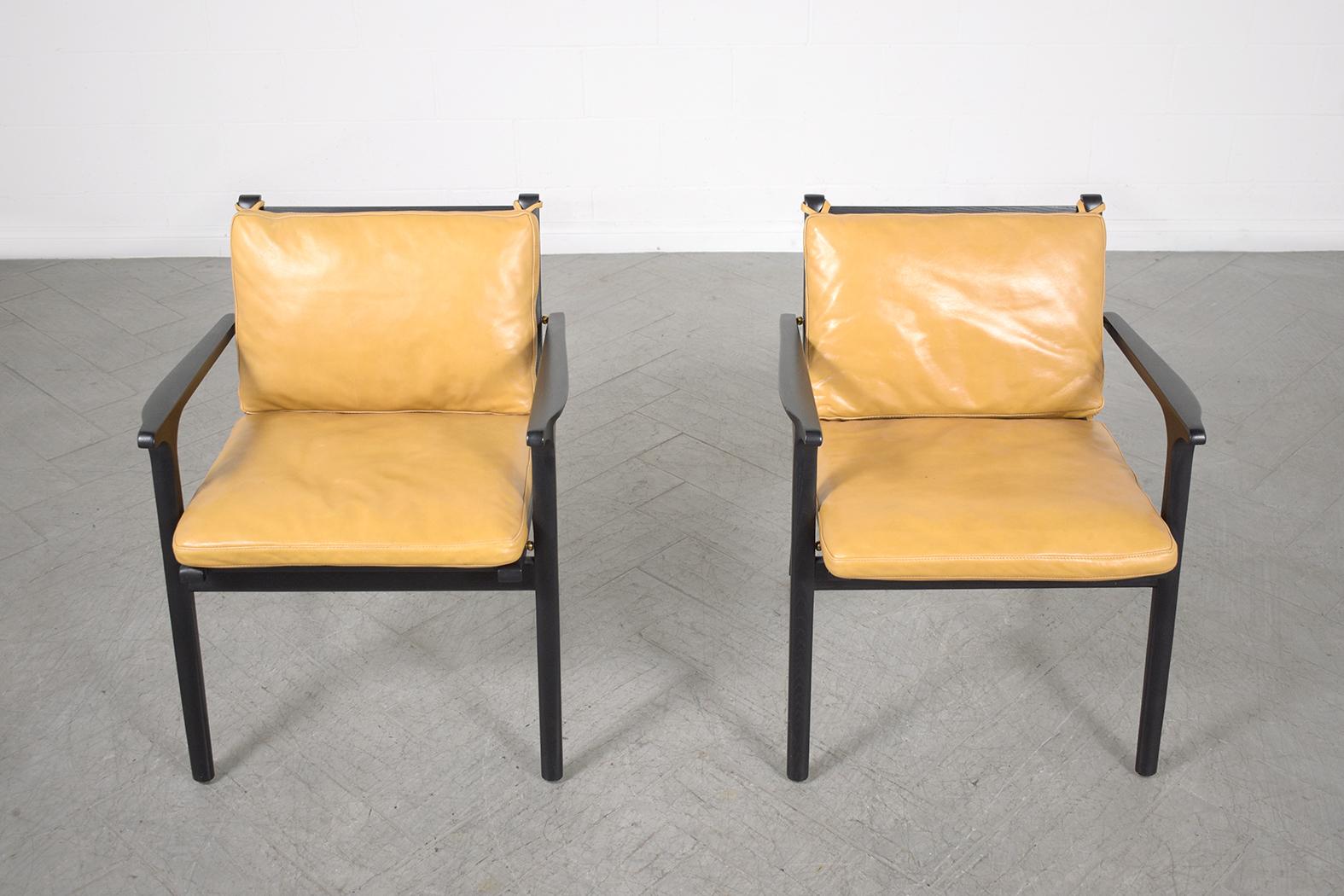 Mid-Century Modern Modern Leather Armchairs: Mustard Yellow Upholstery with Black Oak Frame For Sale