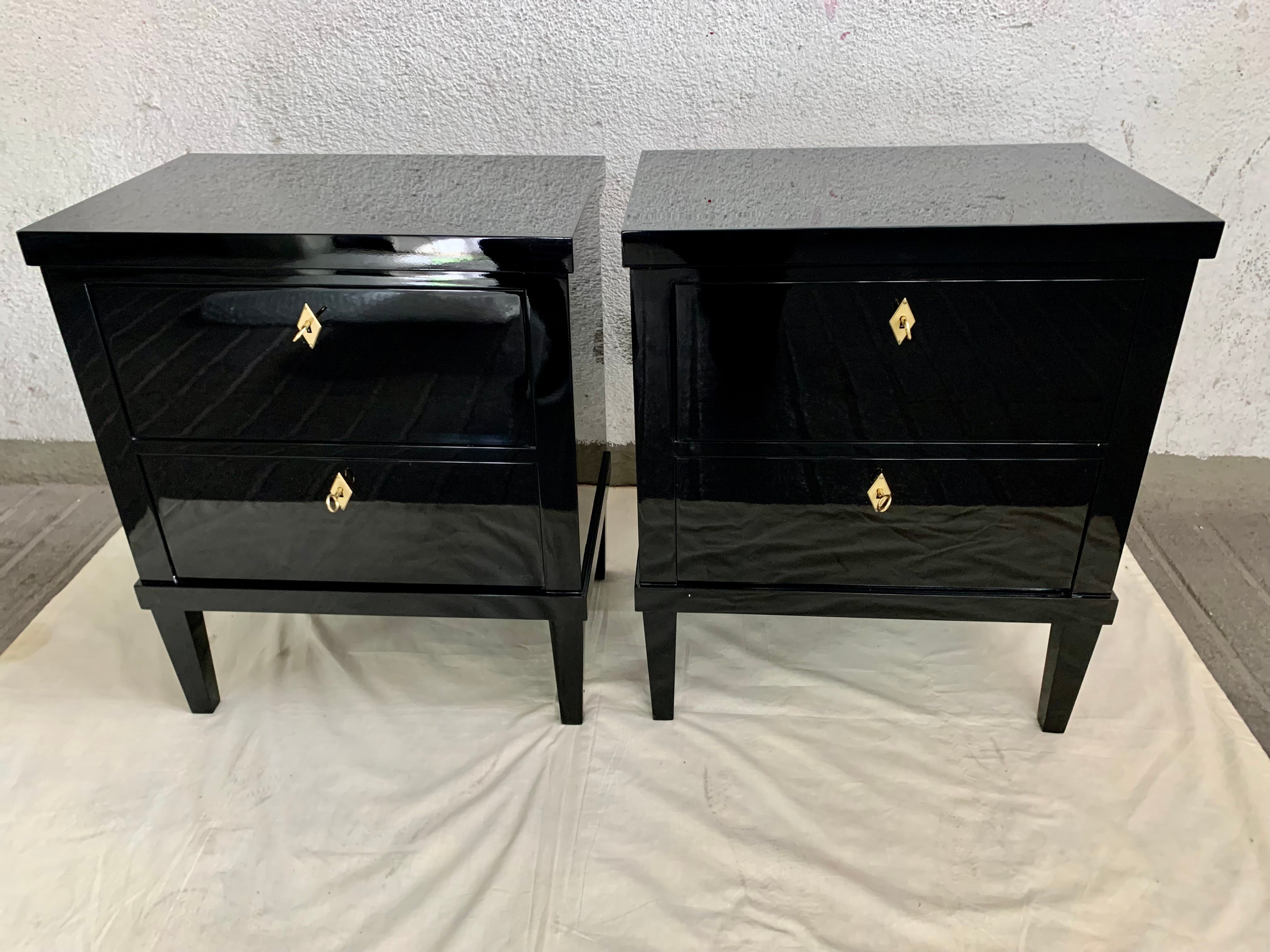 Pair of small commodes or night tables, in Biedermeier style, with two drawers.
The commodes are a handmade production, made by us, our craftsman cabinrtmarker and a craftsman lacquer in beech wood, the drawers boxes are made of Spanish pine, with