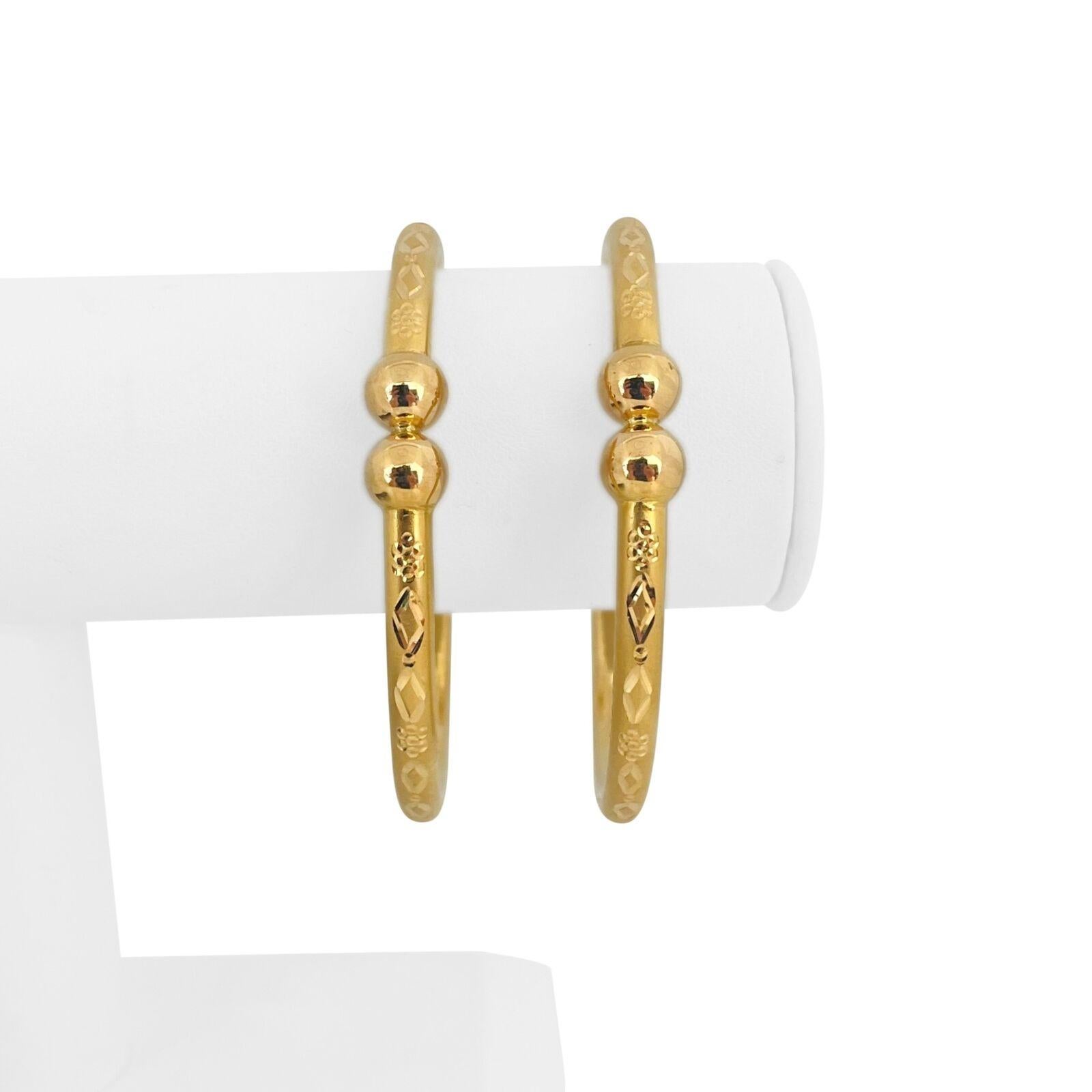 Pair of 22k Yellow Gold 37.9g Diamond Cut Floral Fancy Bangle Bracelets 7.5