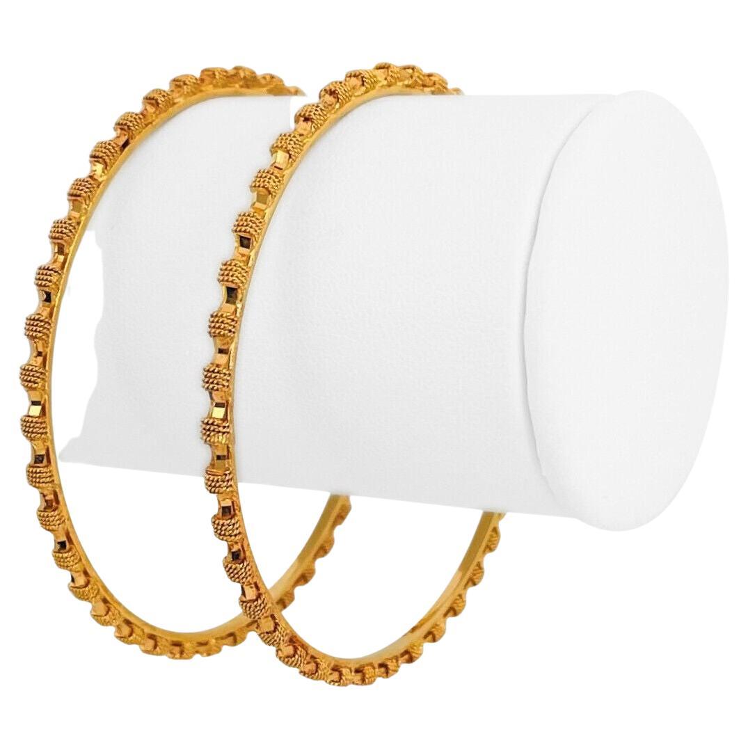 Pair of 21 Karat Yellow Gold Diamond Cut Greek Key Bangle Bracelets For Sale at 1stDibs