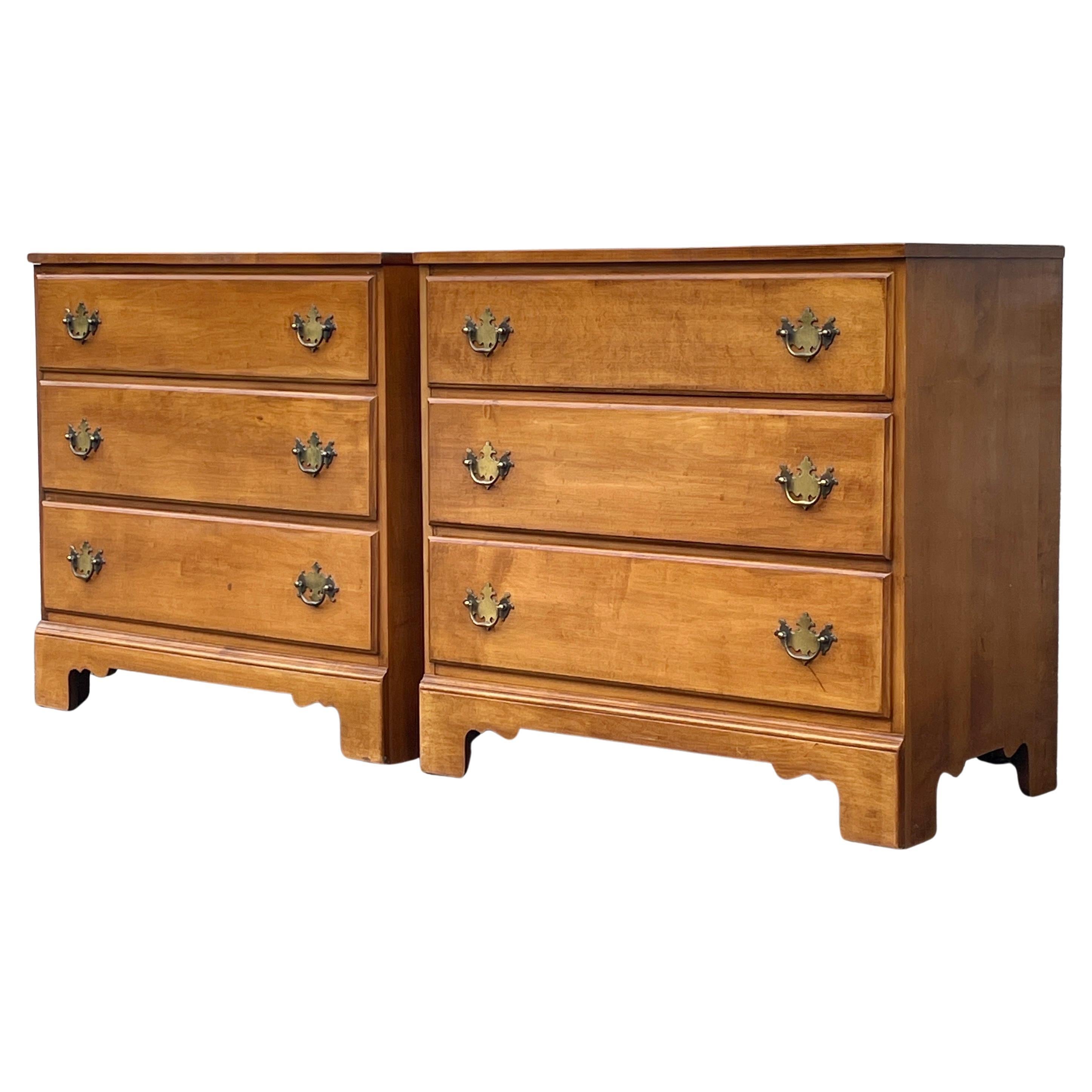 A beautiful pair of Maplewood chest of drawers with brass hardware by Boston's Rapids Furniture Cooperation.