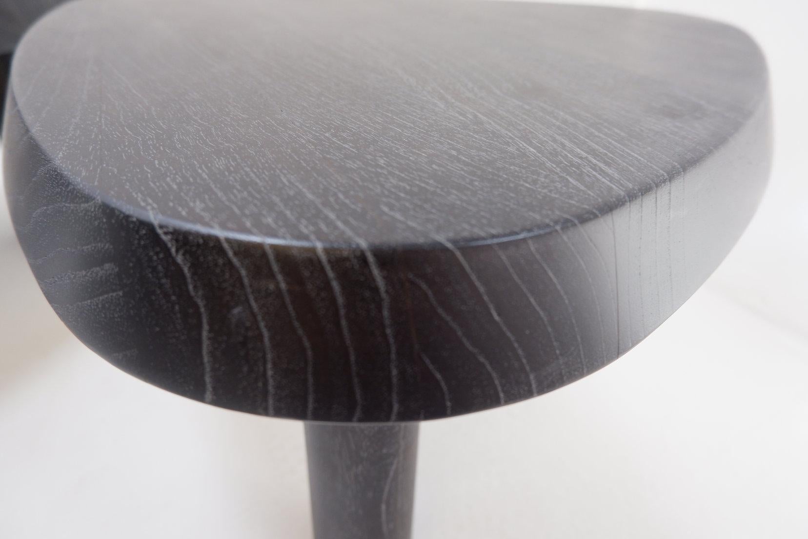 In the spirit of Pierre Chapo T23A table
Measures : 62x60cm H:36cm 
Material : Wood 
With their Scandinavian-inspired design, these coffee tables instantly bring a Mid-Century Modern touch to your interior. Finished in an anthracite veneer, they