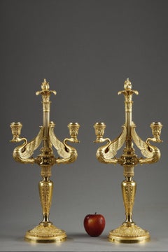 Pair of 3-light torches in chased and gilded bronze, signed Barbedienne