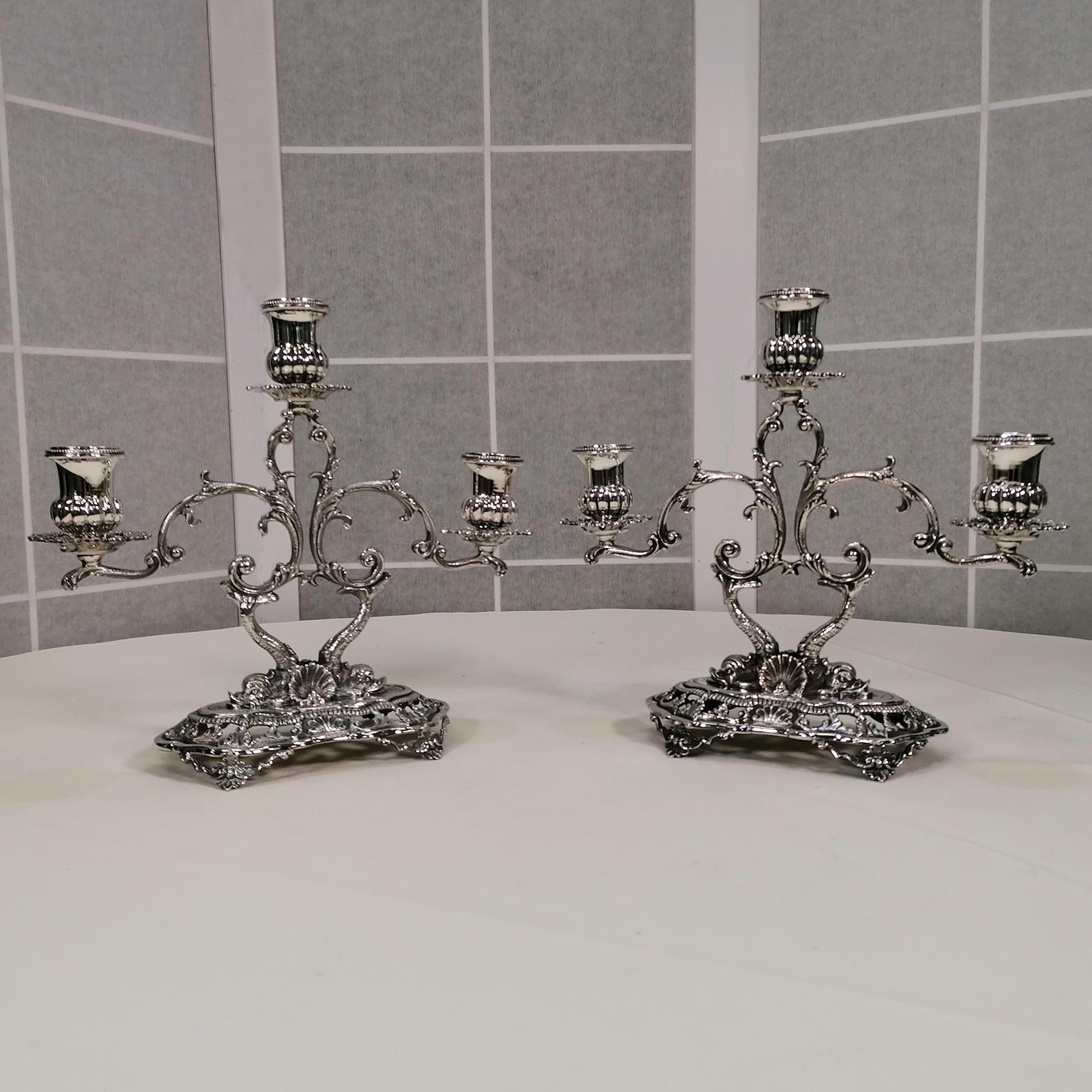 Forged Pair of 3-lights Solid Silver Italian candelabras in Baroque style For Sale