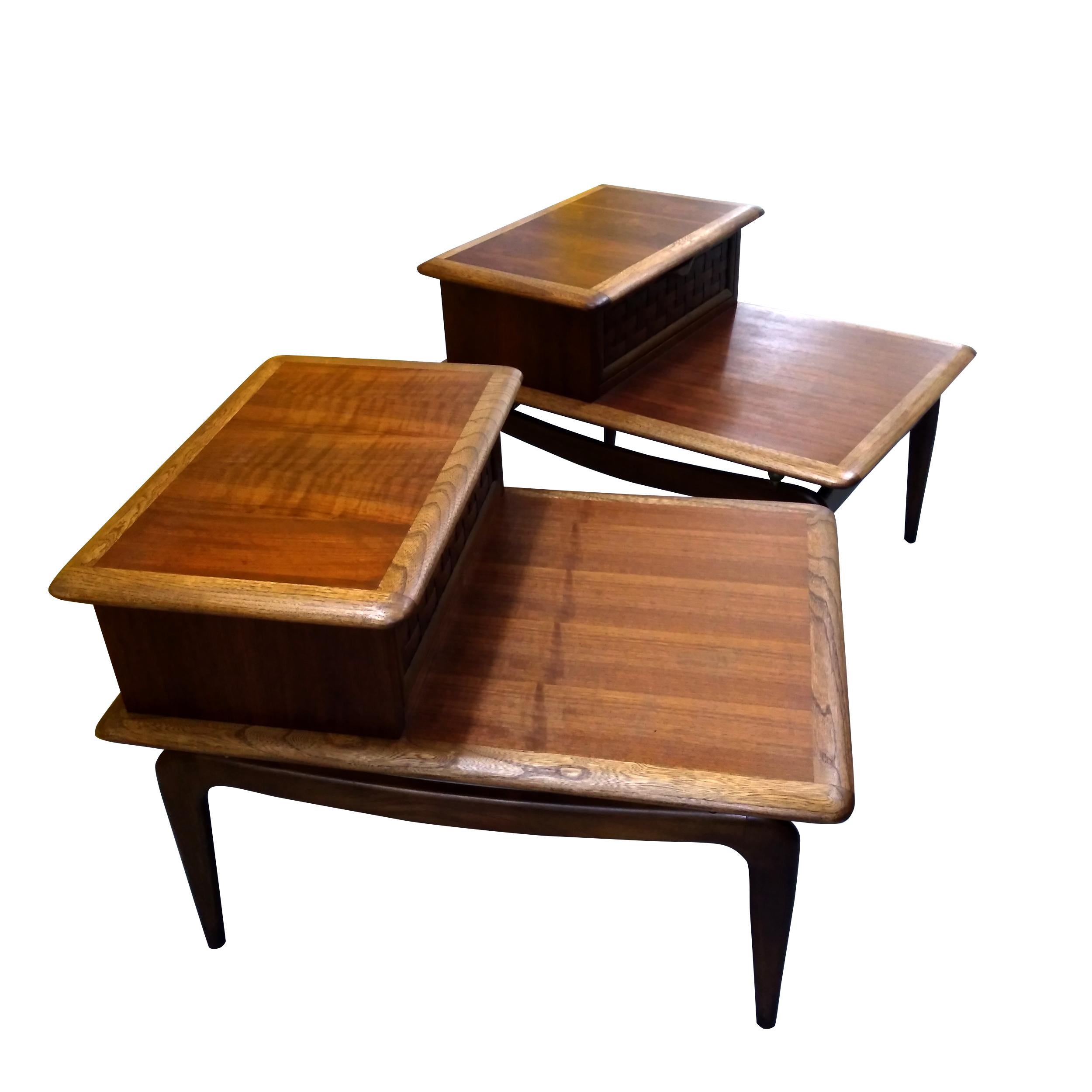 Pair of 30? Andre Bus for Lane Acclaim end tables


Two-tier side tables in walnut and ash with dovetail details.
Measures: 21