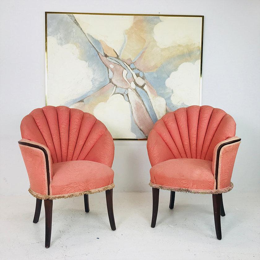 Pair of deco opposing channel back chairs. Chairs are in good vintage condtion with original fabric. Refinishing & new upholstery are recommend but can be used as-is, circa 1940s.

Dimensions:
28.5