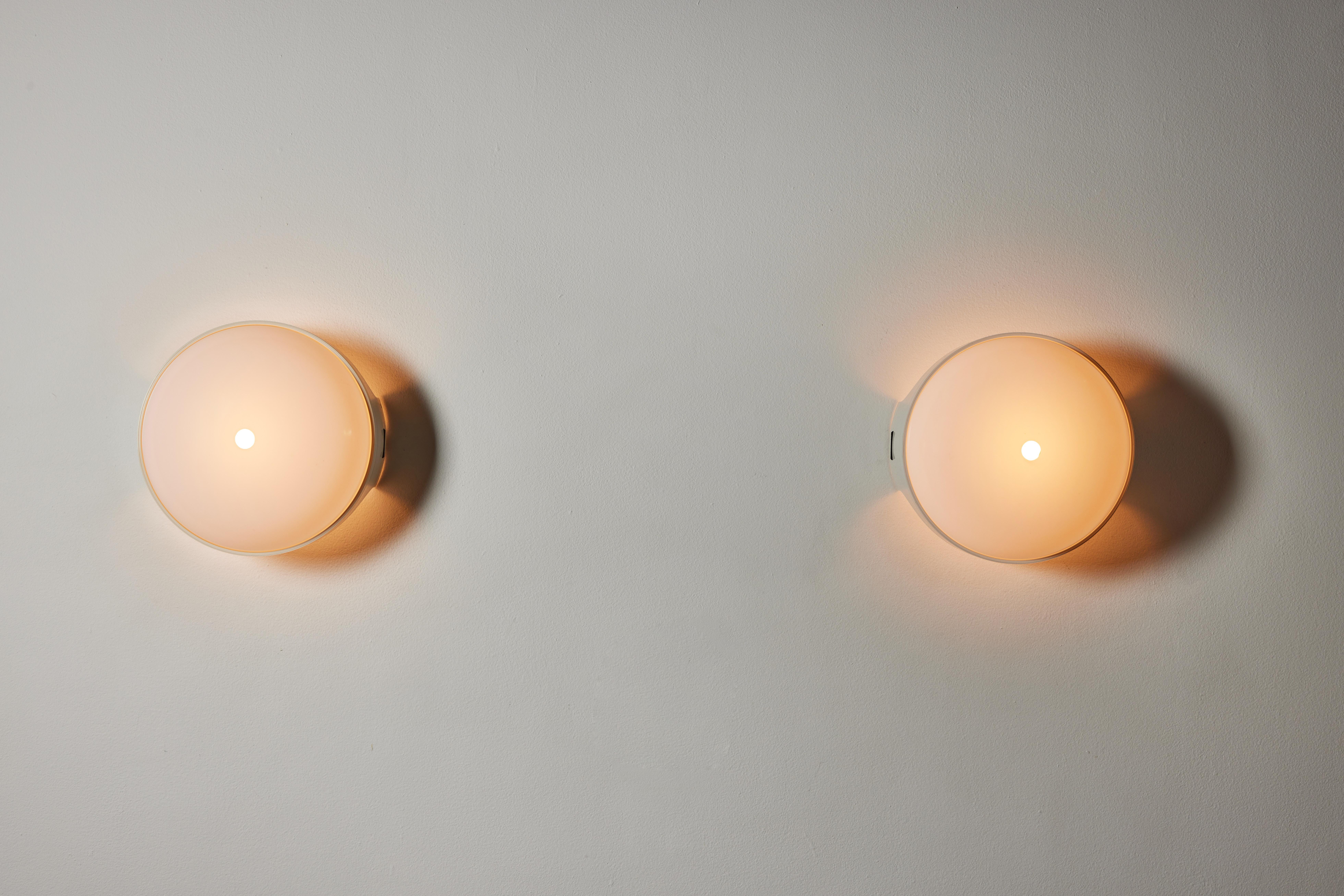 Pair of 4332 wall/ceiling lights by Gian Emilio, Piero & Anna Monti for Kartell. Designed and manufactured in Italy, 1966. Resin, acrylic. Rewired for U.S. standards. We recommend one E27 60w maximum bulb per fixture. Bulbs provided as a one time