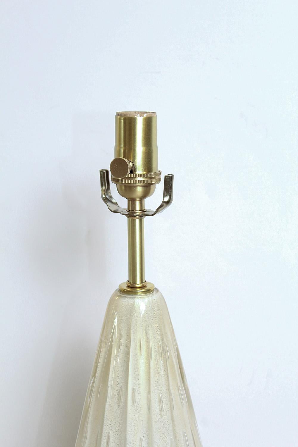 gold and white lamps