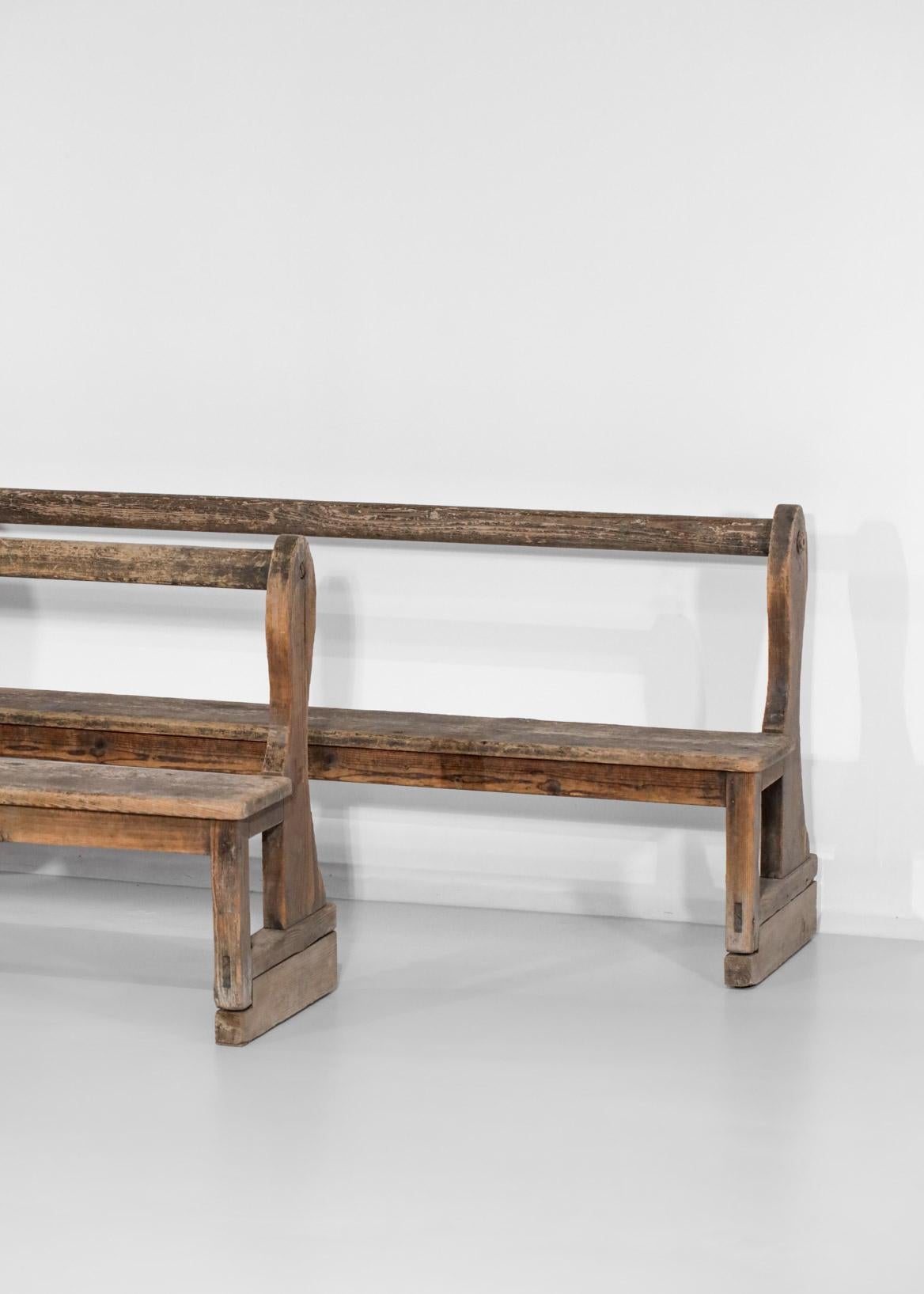 Pair of French church pews from the 50's in solid oak. Many traces of wear due to time which give these two pews a very nice patina (see pictures).
Designer : Hand made, unknown.