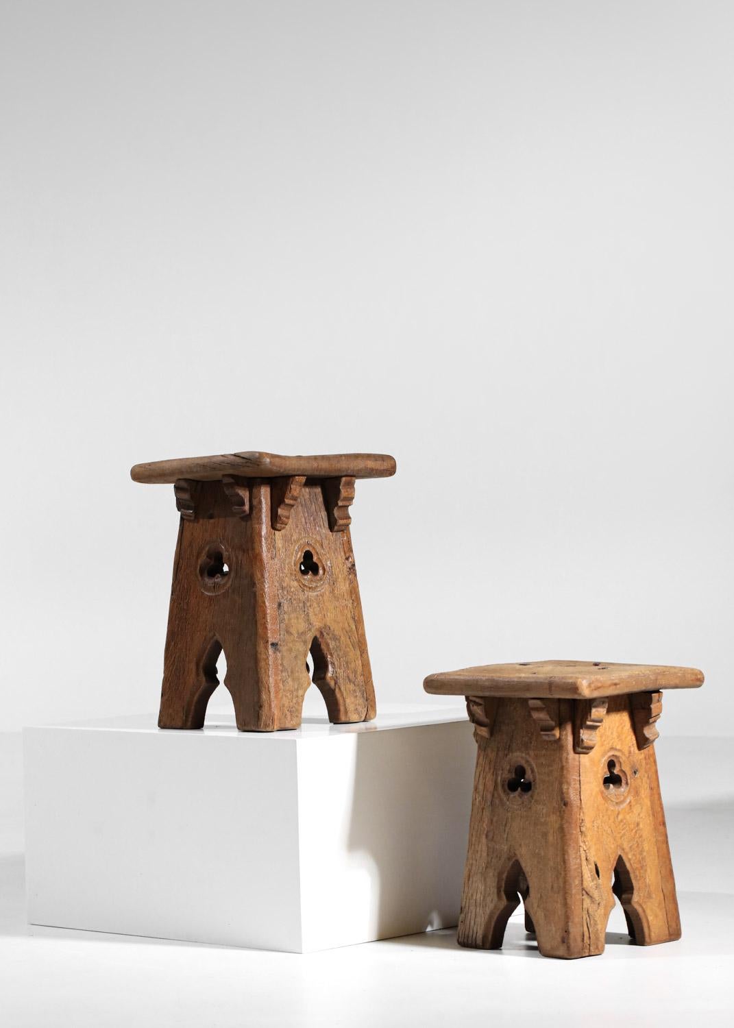 Chestnut pair of 50's french folk art brutalist stools For Sale