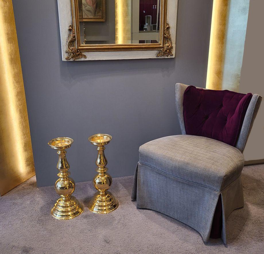 These extraordinary gold-plated brass candleholders are impressive due to their sheer size
of 51 cm / 19,69 inches. 
A decorative highlight for a spacious home.
The elegant balustraded design is timeless and blends well with modern or antique