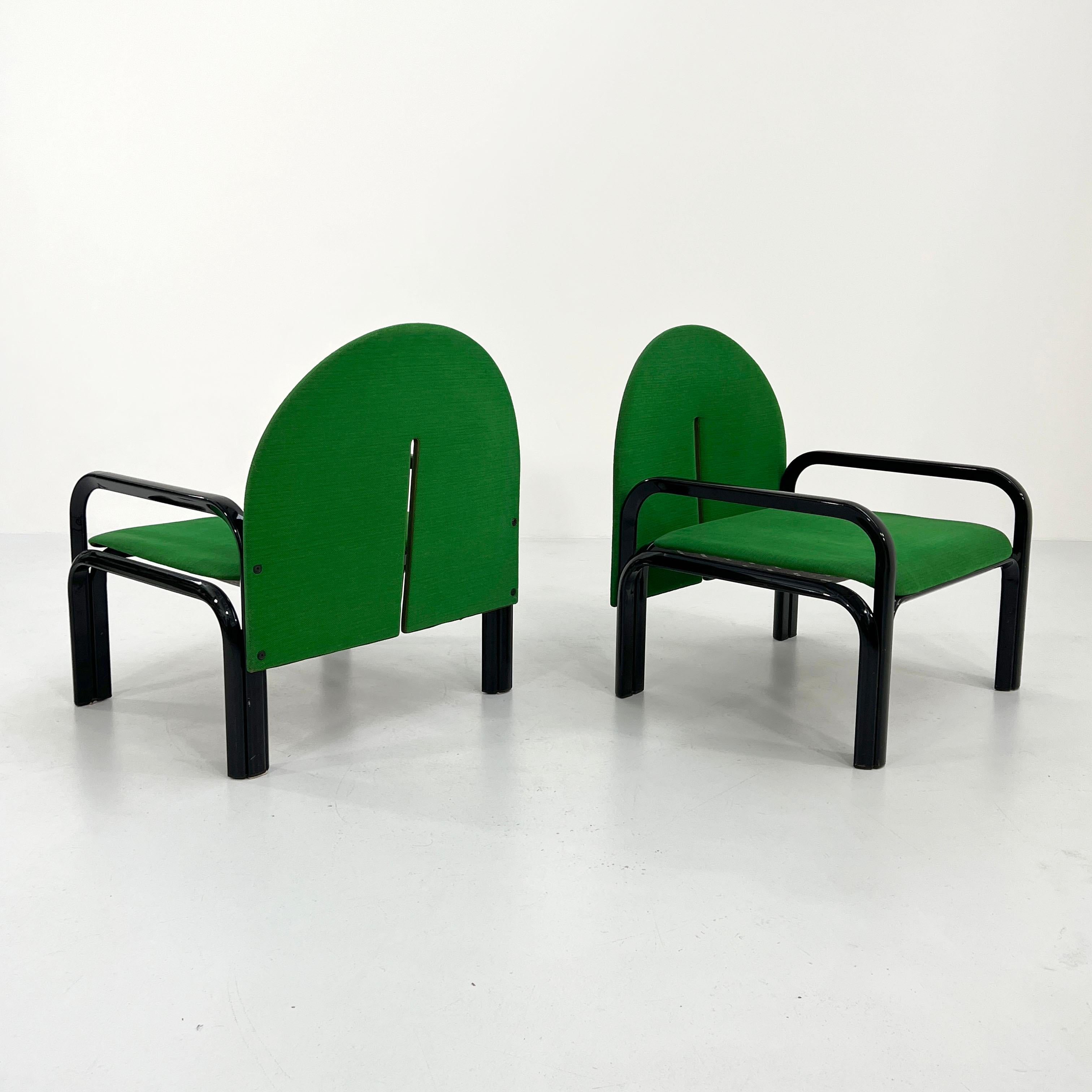 Designer - Gae Aulenti
Producer - Knoll
Model - 54 L Armchairs
Design Period - Seventies 
Measurements - Width 70 cm x Depth 61 cm x Height 77 cm x Seat Height 35 cm
Materials - Fabric, Leather, Metal
Color - Green, Black
Condition - Good