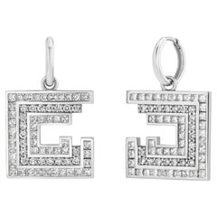 Paire de boucles d'oreilles en or blanc 18k serties de 5,5 carats de diamants taille princesse