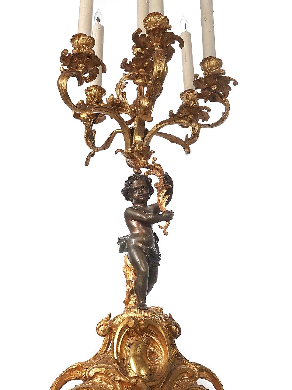 Pair of 6 Candle Electrified Gilded Bronze Putti Candelabra In Good Condition For Sale In Peekskill, NY