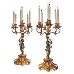 Pareja de Candelabros de 6 Velas Electrificadas Putti de Bronce Dorado