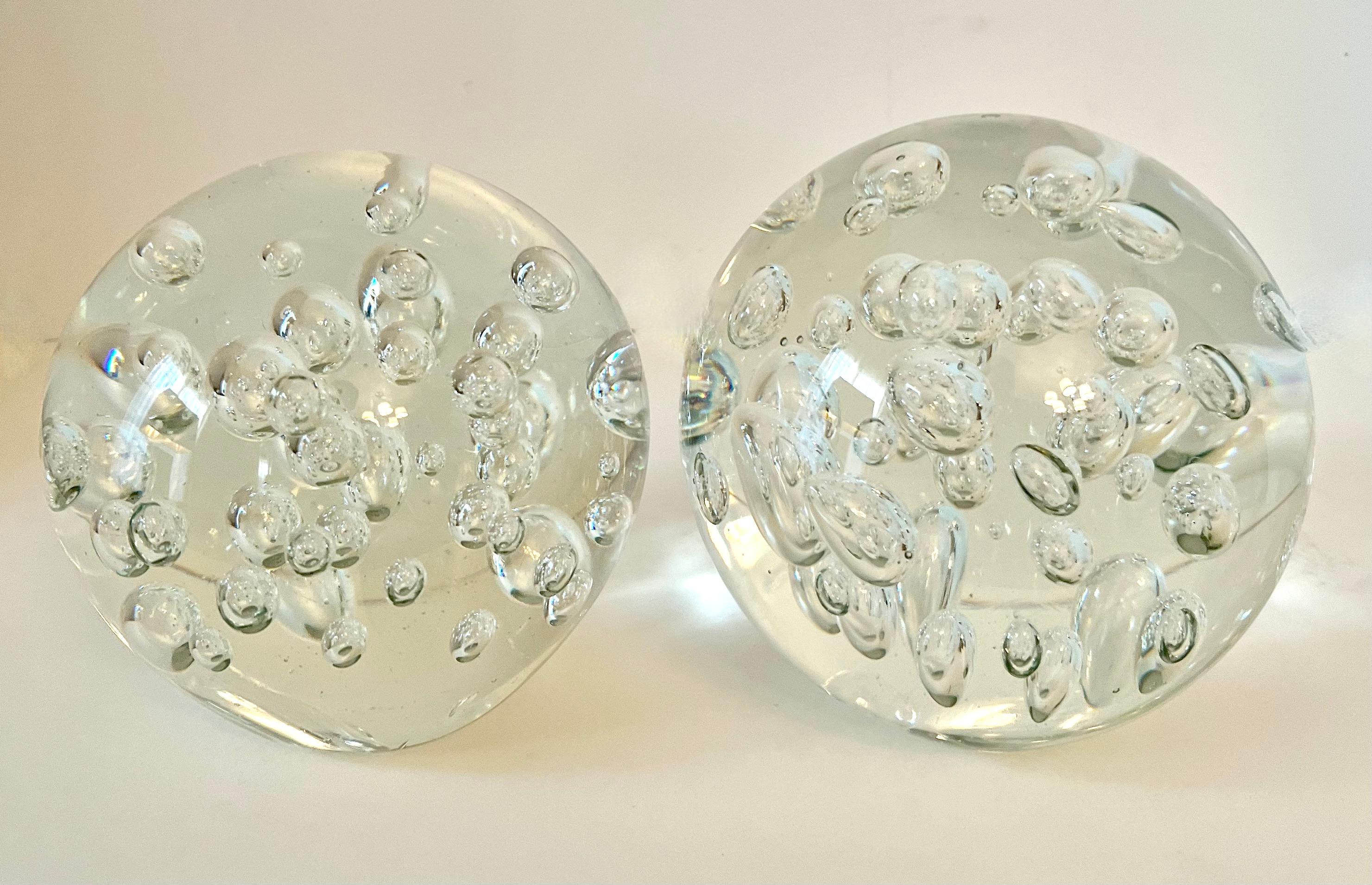 Two Clear Paperweights with bubbles.  The pair are very large at measure 5 7/8