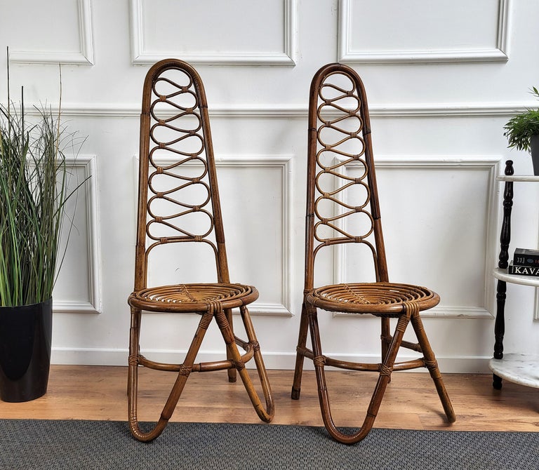 Beautiful 1960s pair of bamboo chairs in the design of Dirk Van Sliedrecht. These charming Mid-Century Modern pieces with the unique design and tall high back where the organic beauty of the woven materials is timeless and classic are incredibly