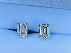 Pair of 6.10 Carat VS Clarity Emerald Cut Diamond Solitaire Stud Earrings 