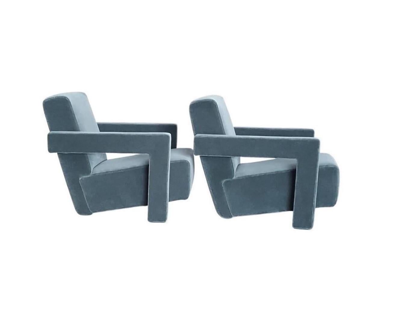 Fantastic pair of modernist lounge chairs, model 637 Utrecht by the designer Gerrit Thomas Rietveld edition Cassina from the 1990s. Each chair has armrests that merge into the front legs. The seat and the backrest come together at an angle to form