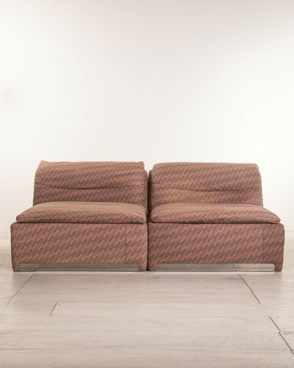 Pair of modular armchairs with chromed steel base and original fabric upholstery. Model P10, design Saporiti for Proposals, 1970s.

CONDITIONS: In good condition, they may show signs of wear due to age.

DIMENSIONS: Height 62 cm; Width 88 cm;