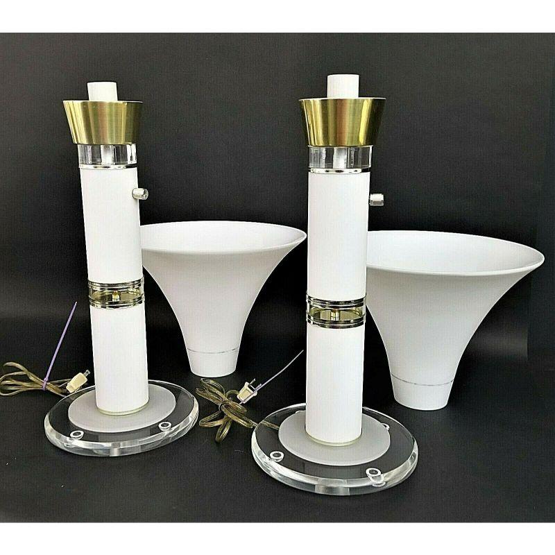 Offering One Of Our Recent Palm Beach Estate Fine Lighting Acquisitions Of A
Pair of 70's Karl Springer Style Lucite Brass Glass Torchiere Table Lamps 

Features footed Lucite bases, and built-in dimmer switches. 

Measurements
27
